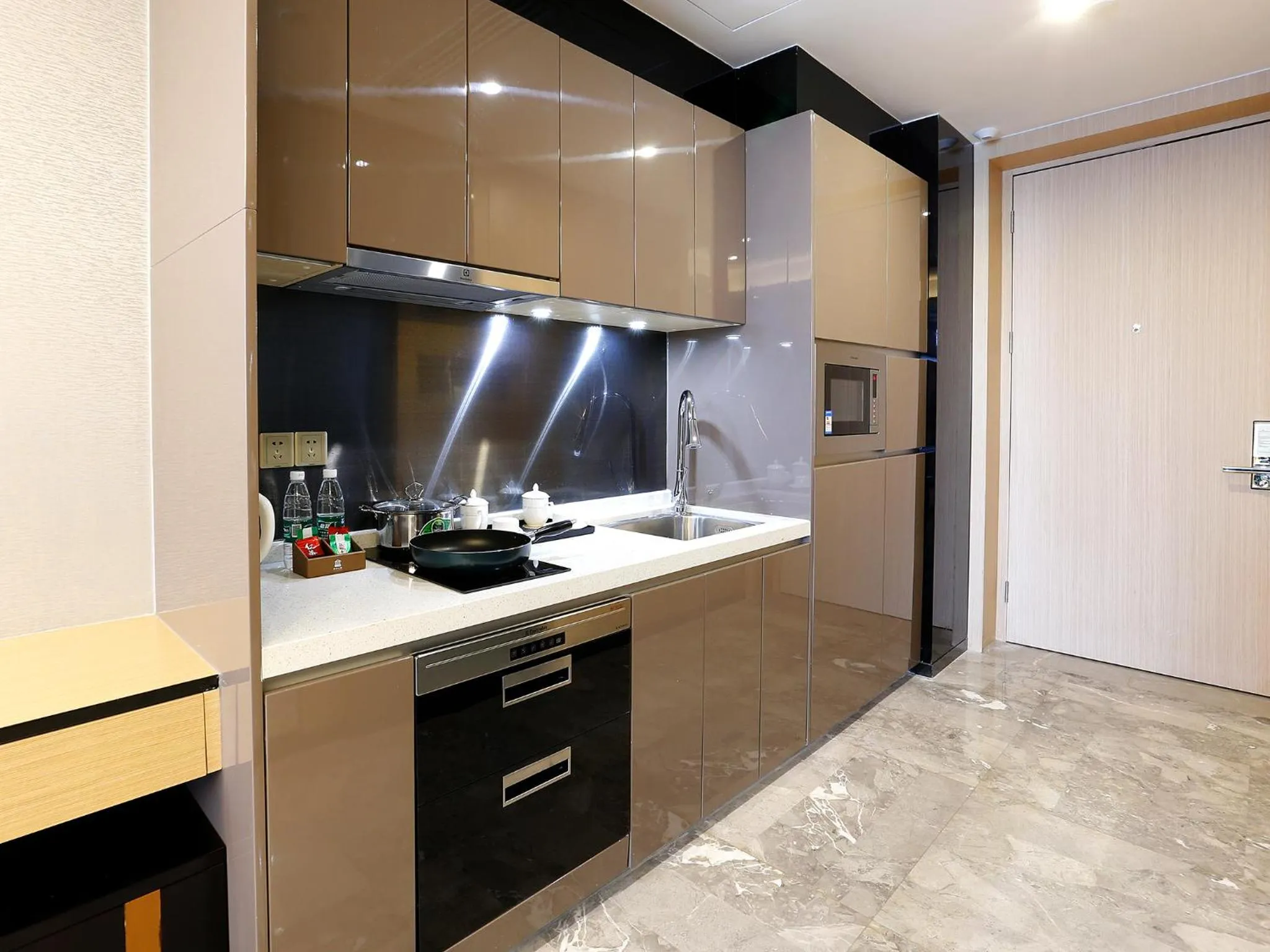 Kitchen or kitchenette in Pengman Beijing Road A-mall Apartment