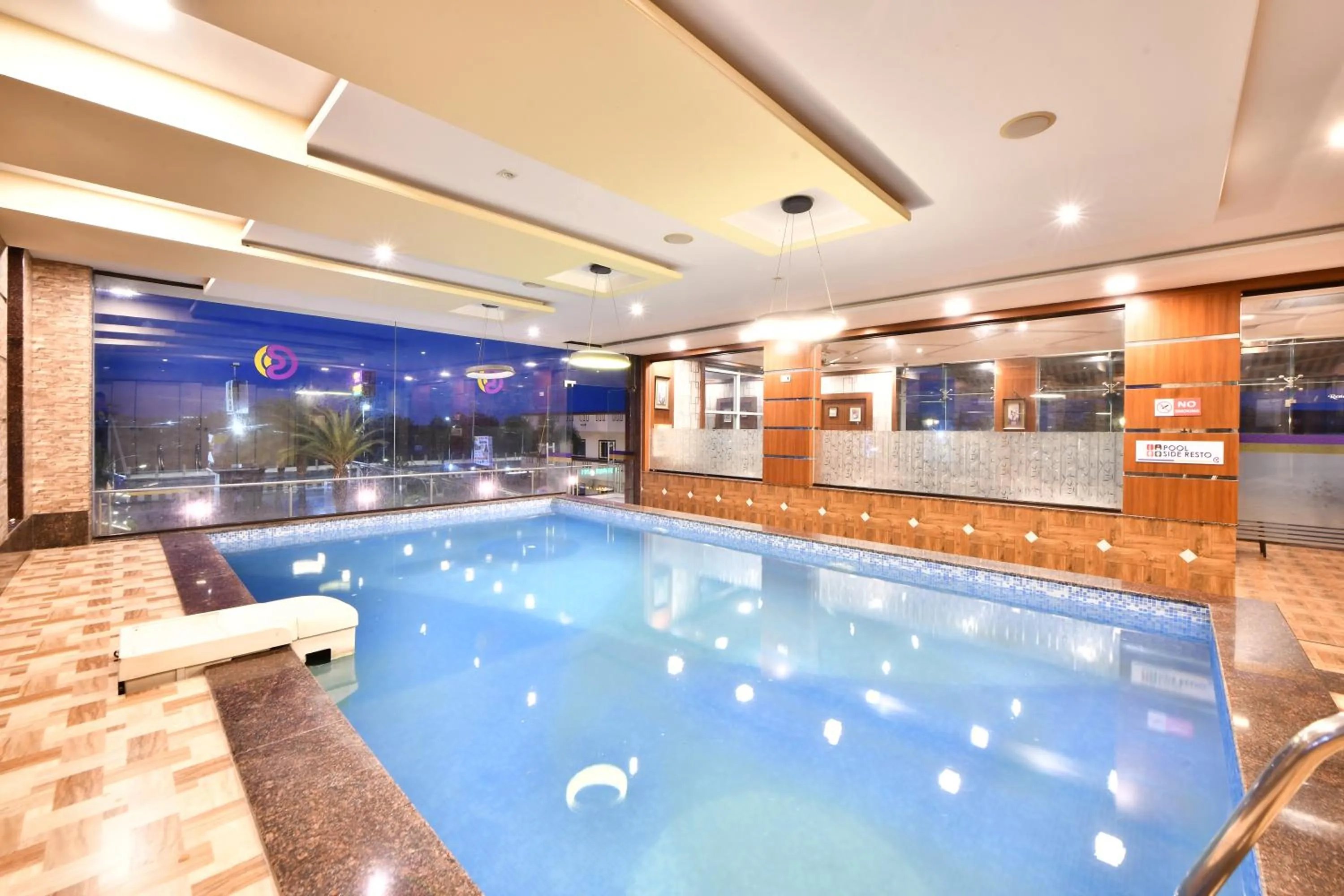 Swimming pool in Click Hotel Sagar Plaza Chakan, Pune