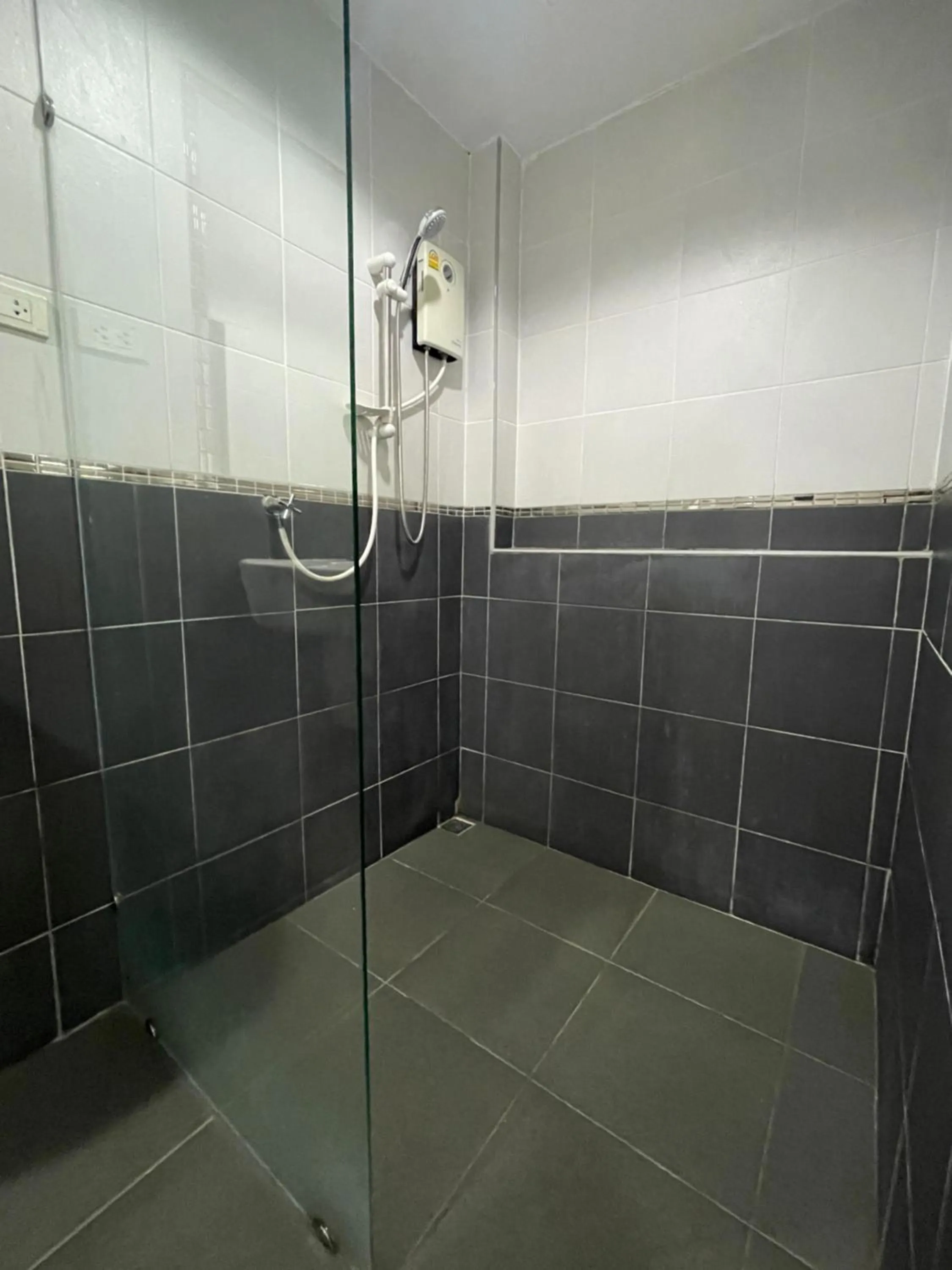 Shower in Lotus Bleu Resort & Restaurant