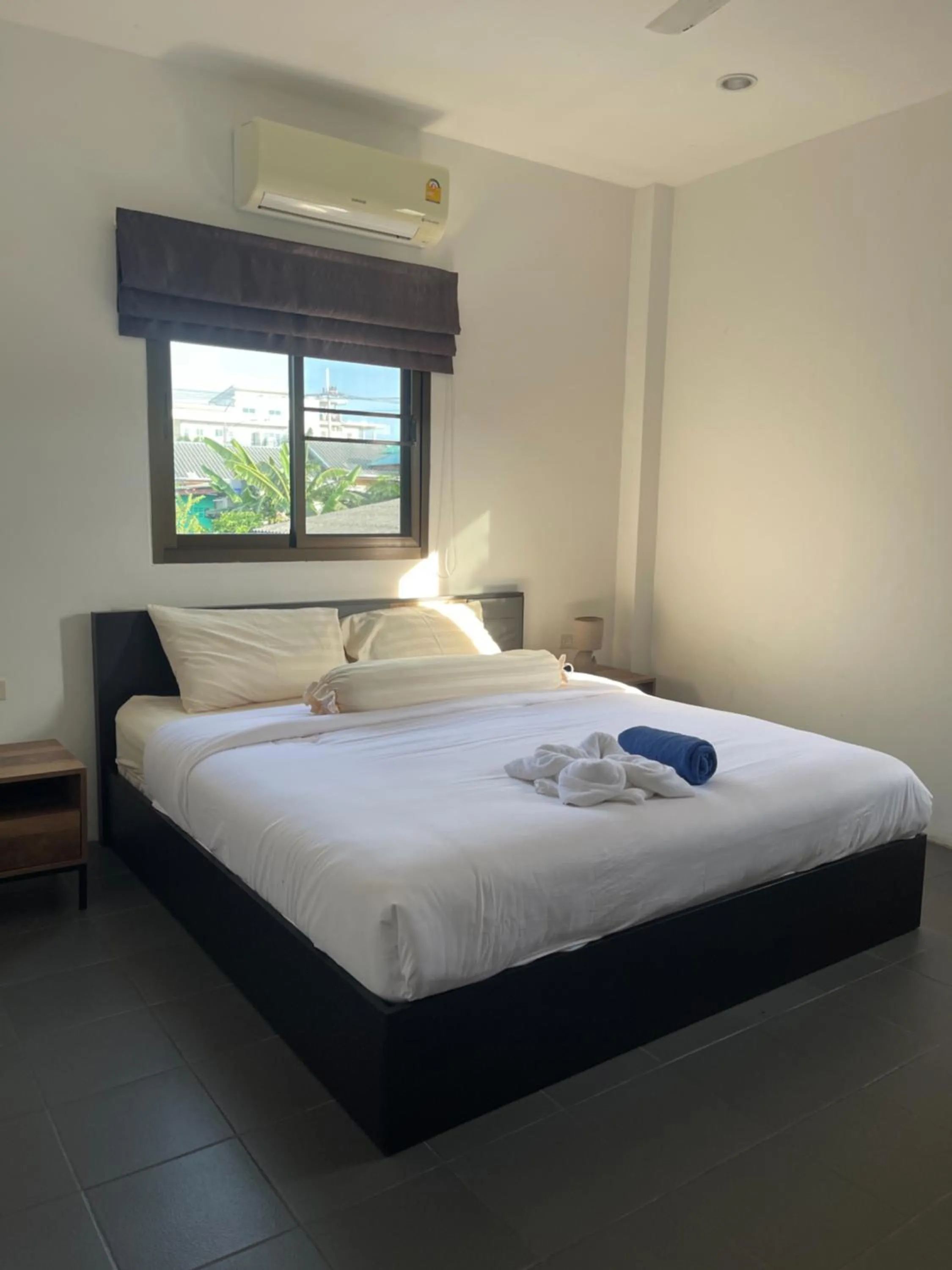 Bed in Lotus Bleu Resort & Restaurant