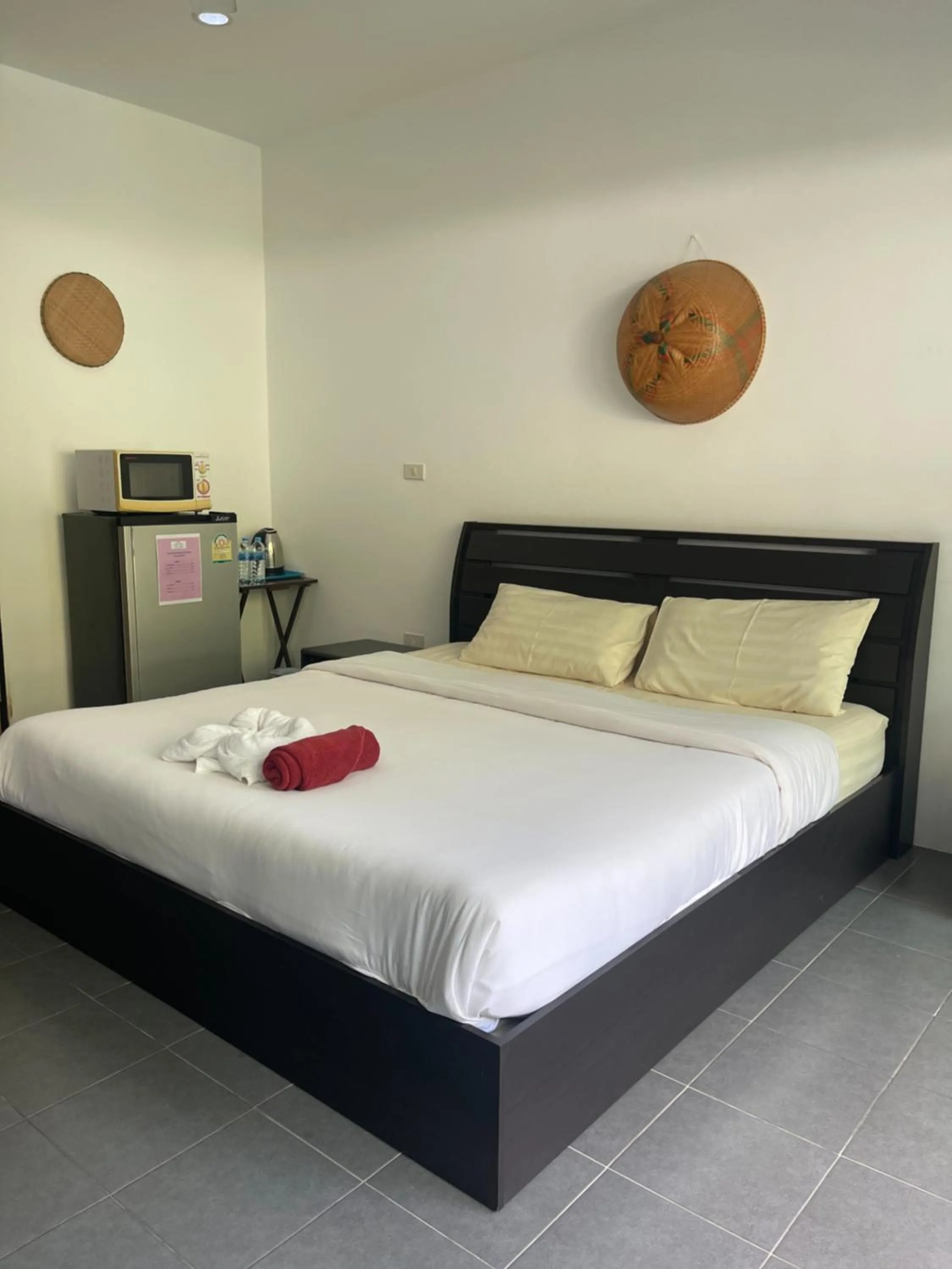 Bed in Lotus Bleu Resort & Restaurant