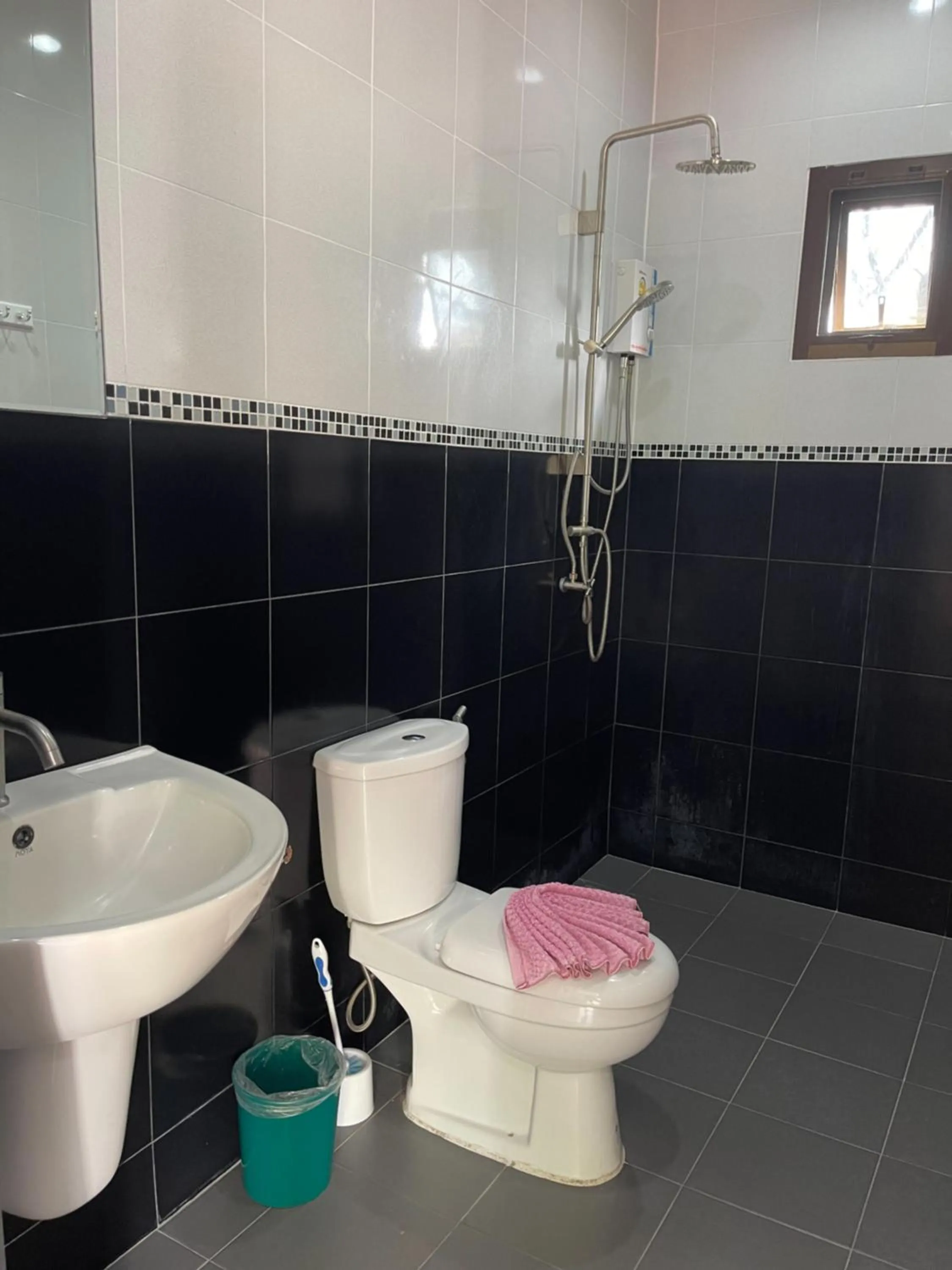 Shower in Lotus Bleu Resort & Restaurant