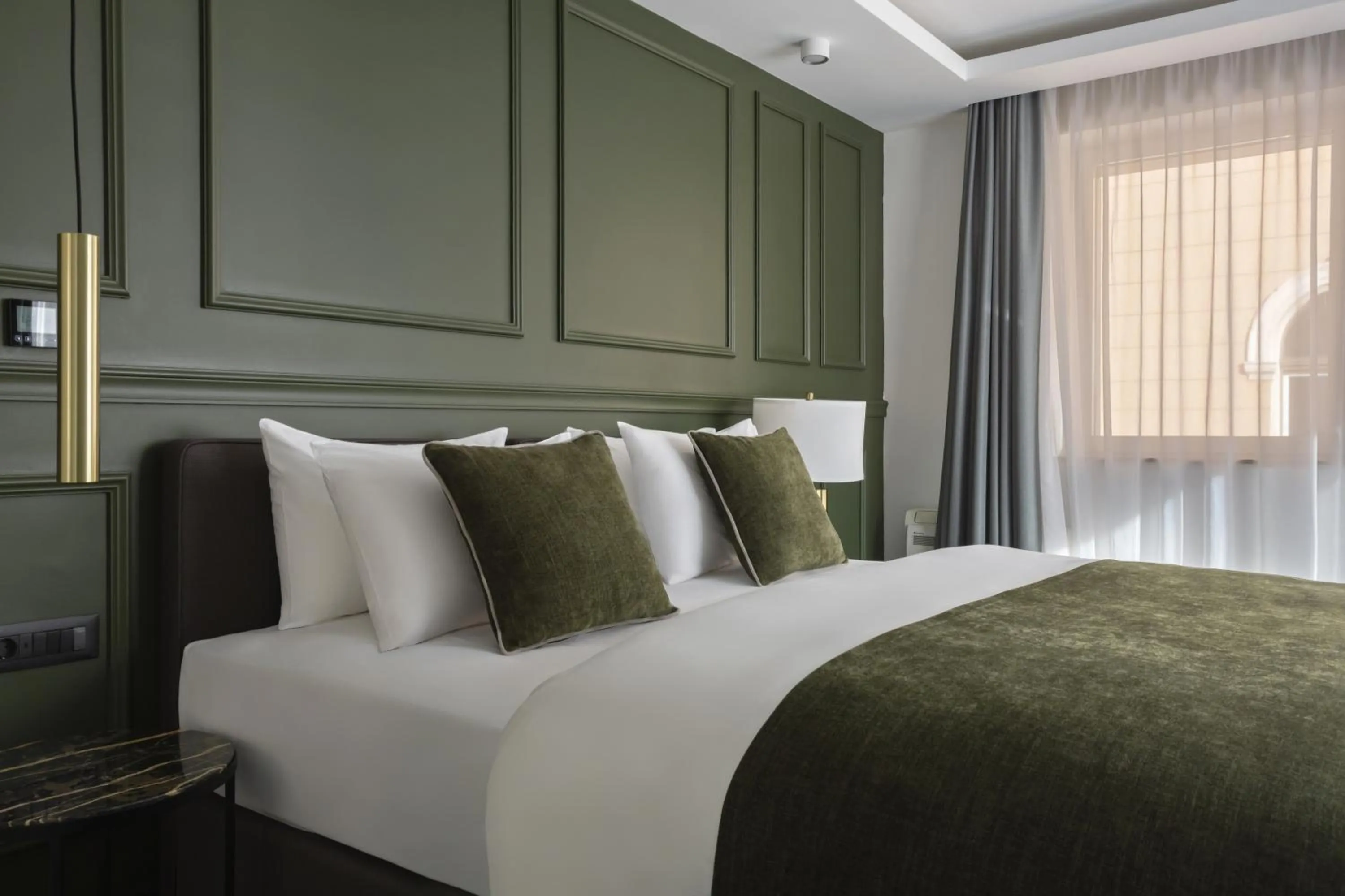 Bed in Apeiro City Avant-garde Hotel