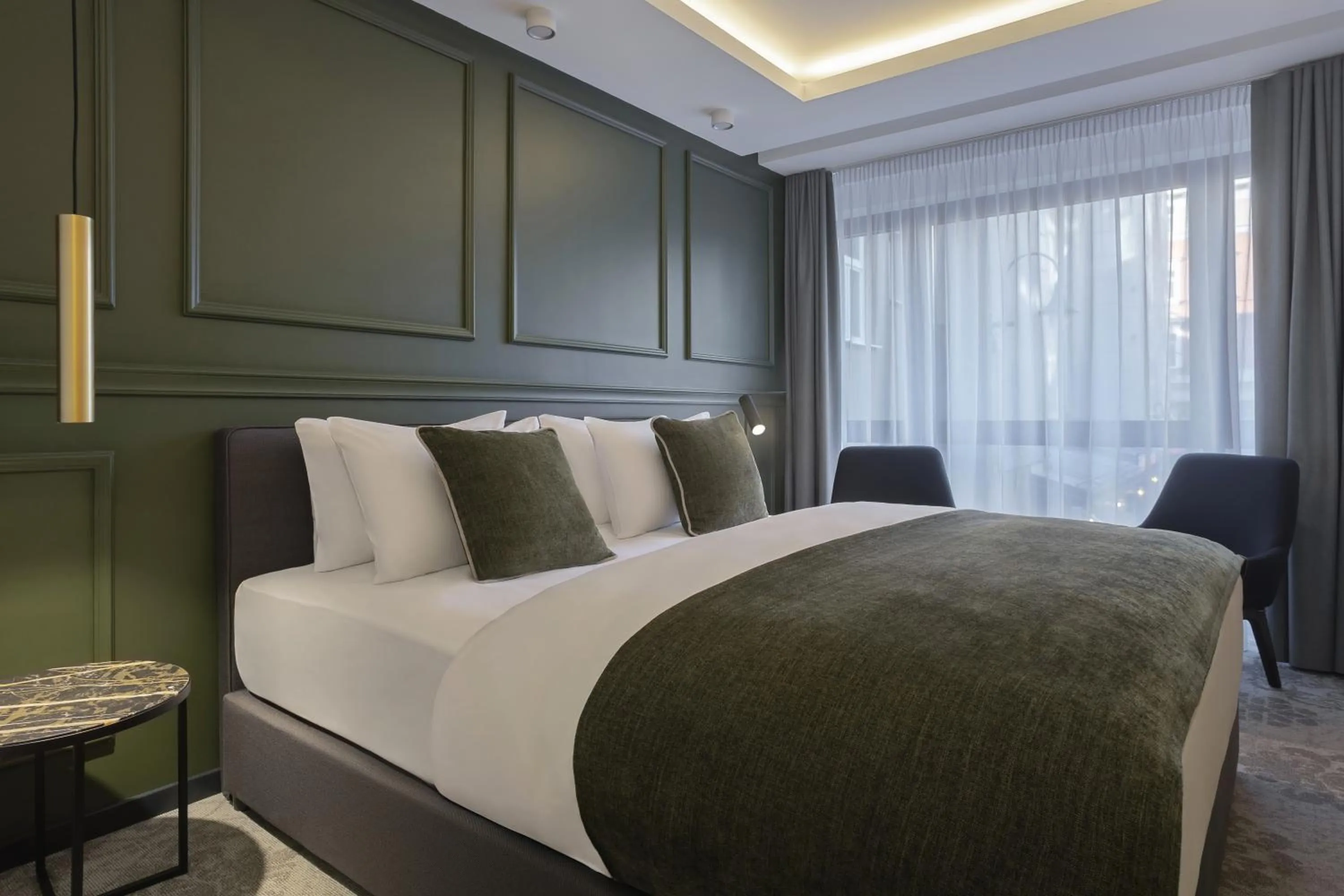 Bed in Apeiro City Avant-garde Hotel