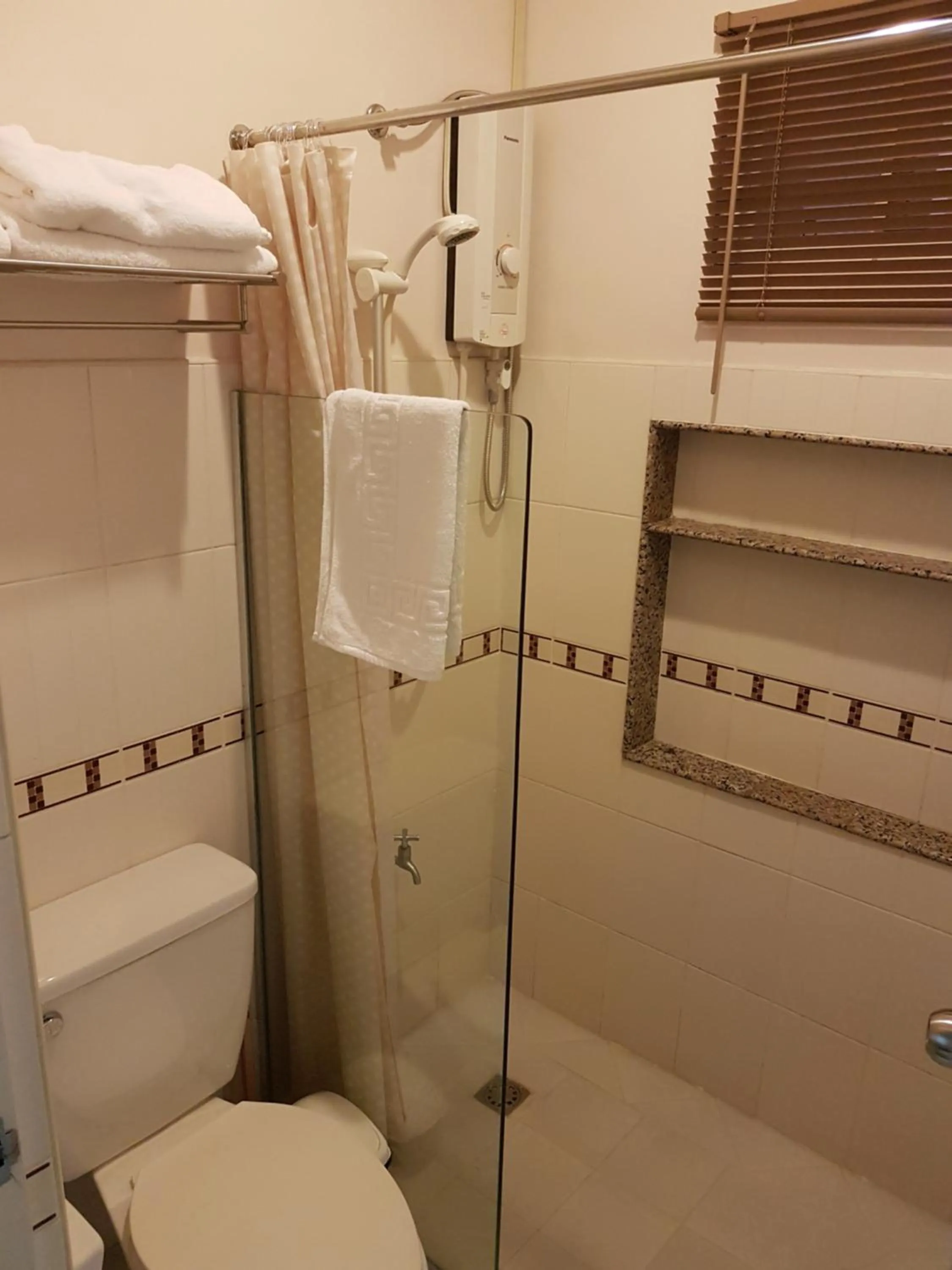 Bathroom in New Manila Suites