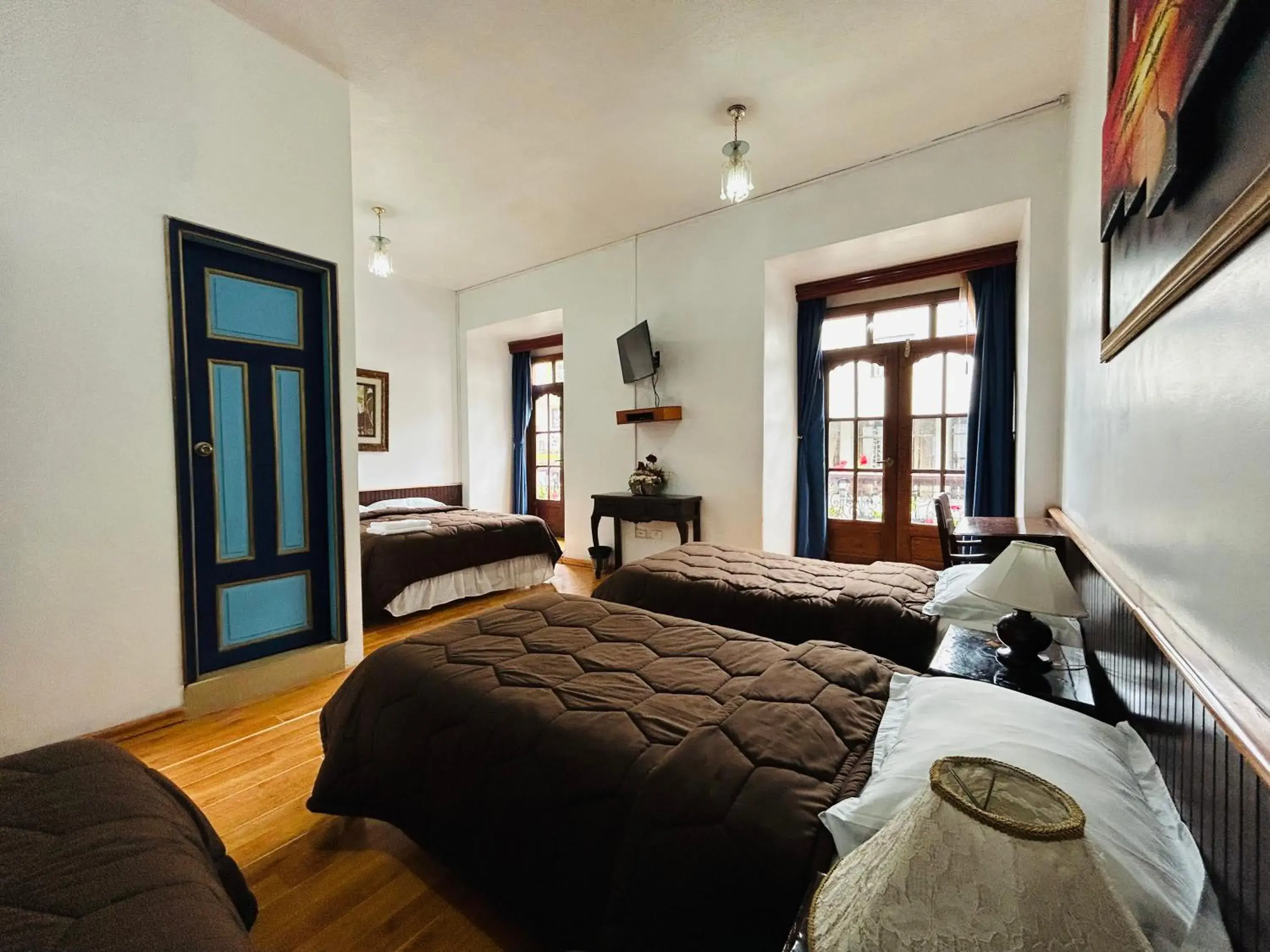 Quadruple Room in Hotel Montecarlo Quadruple Room in Hotel Montecarlo