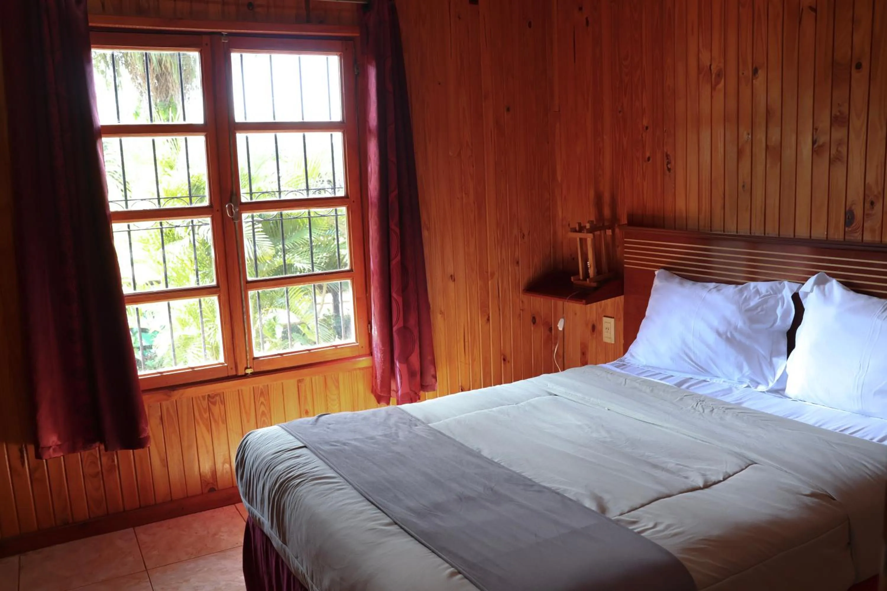 Bed in Terra Iguazú Cabañas