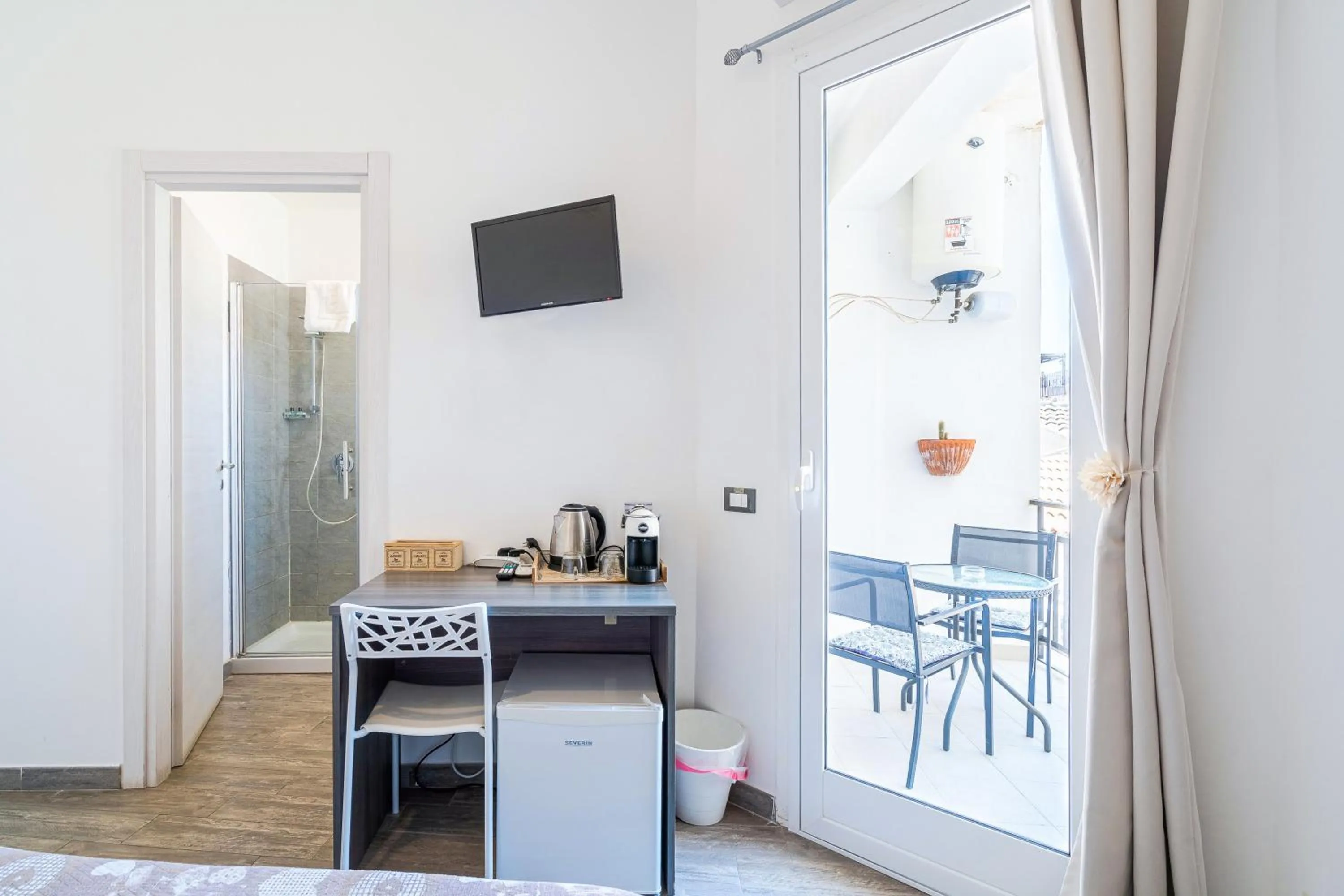 Photo of the whole room in Cavour Rooms