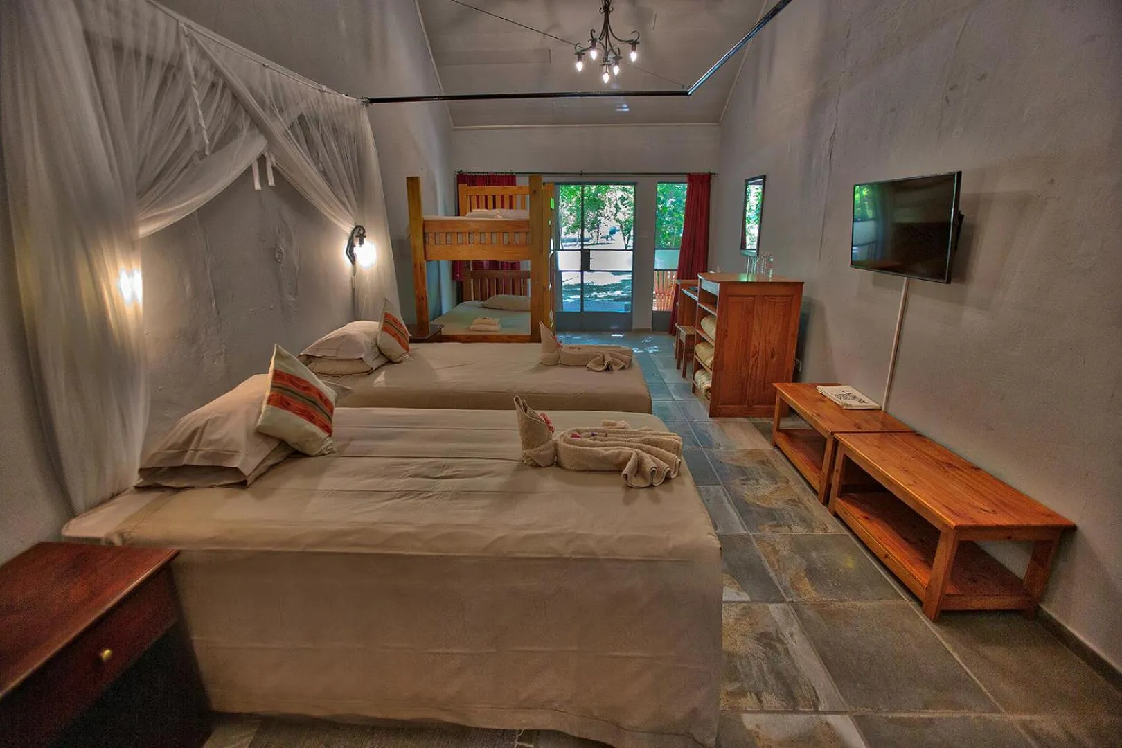 Photo of the whole room, Bed in Island Safari Lodge