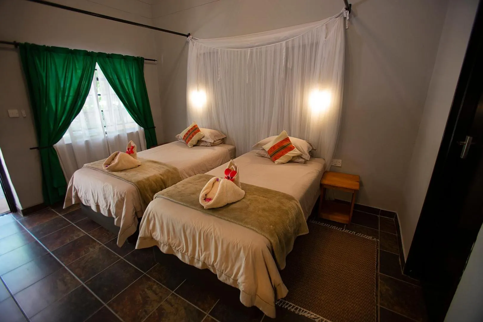 Photo of the whole room, Bed in Island Safari Lodge