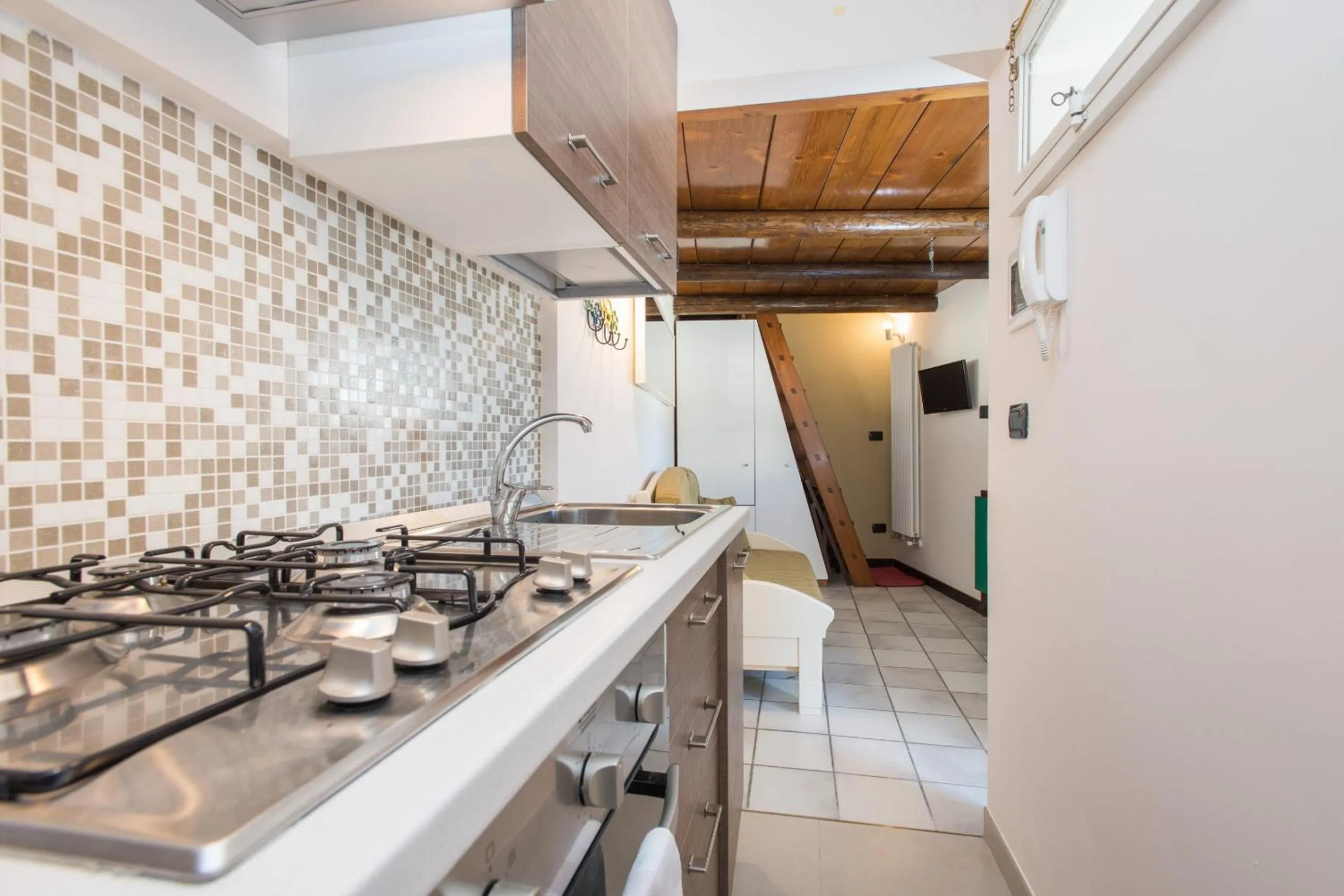 Kitchen or kitchenette in Il Garbino Suite and Apartment