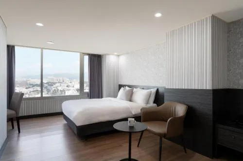 Bed in Elence Hotel