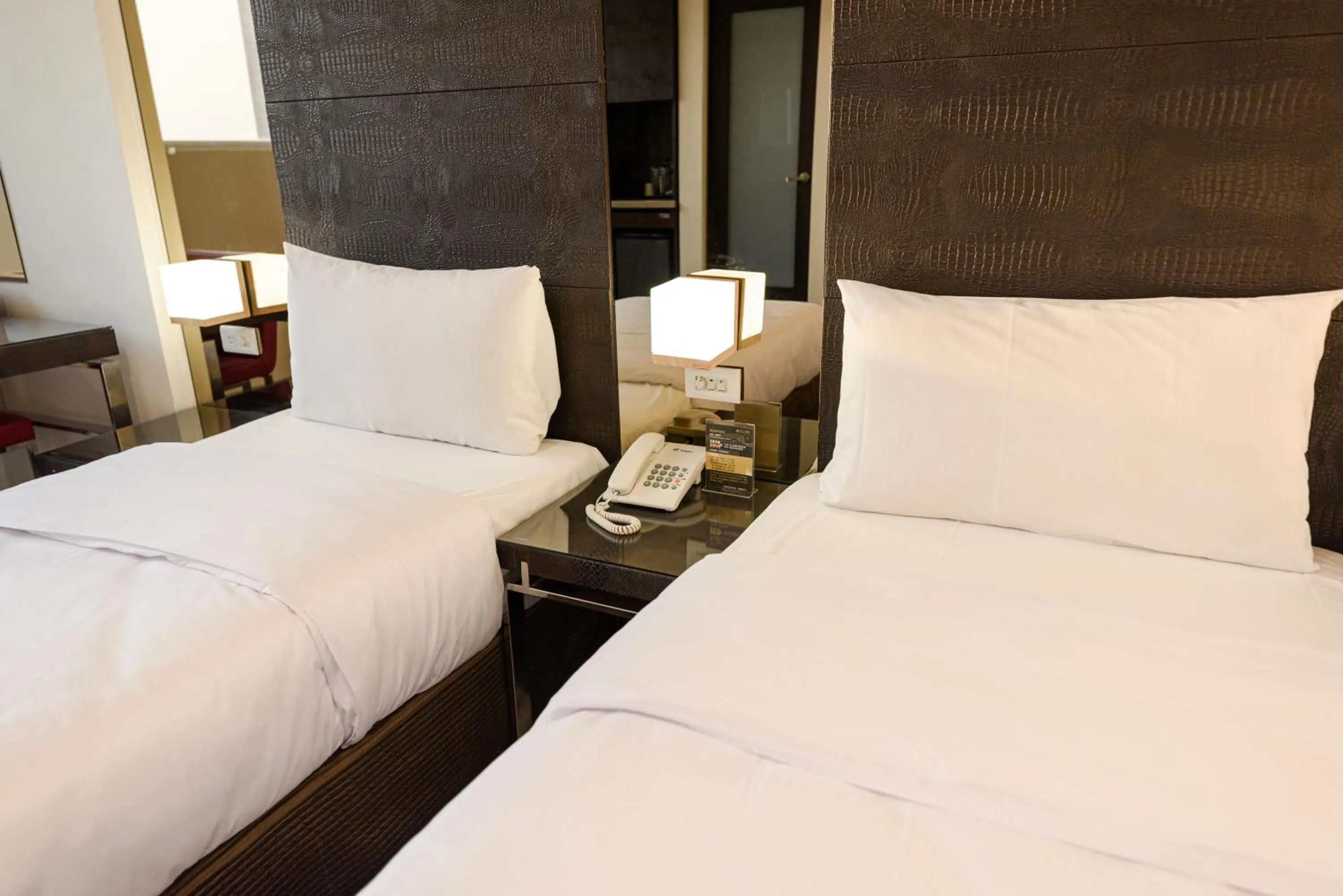 Bed in Jih Lih Hotel