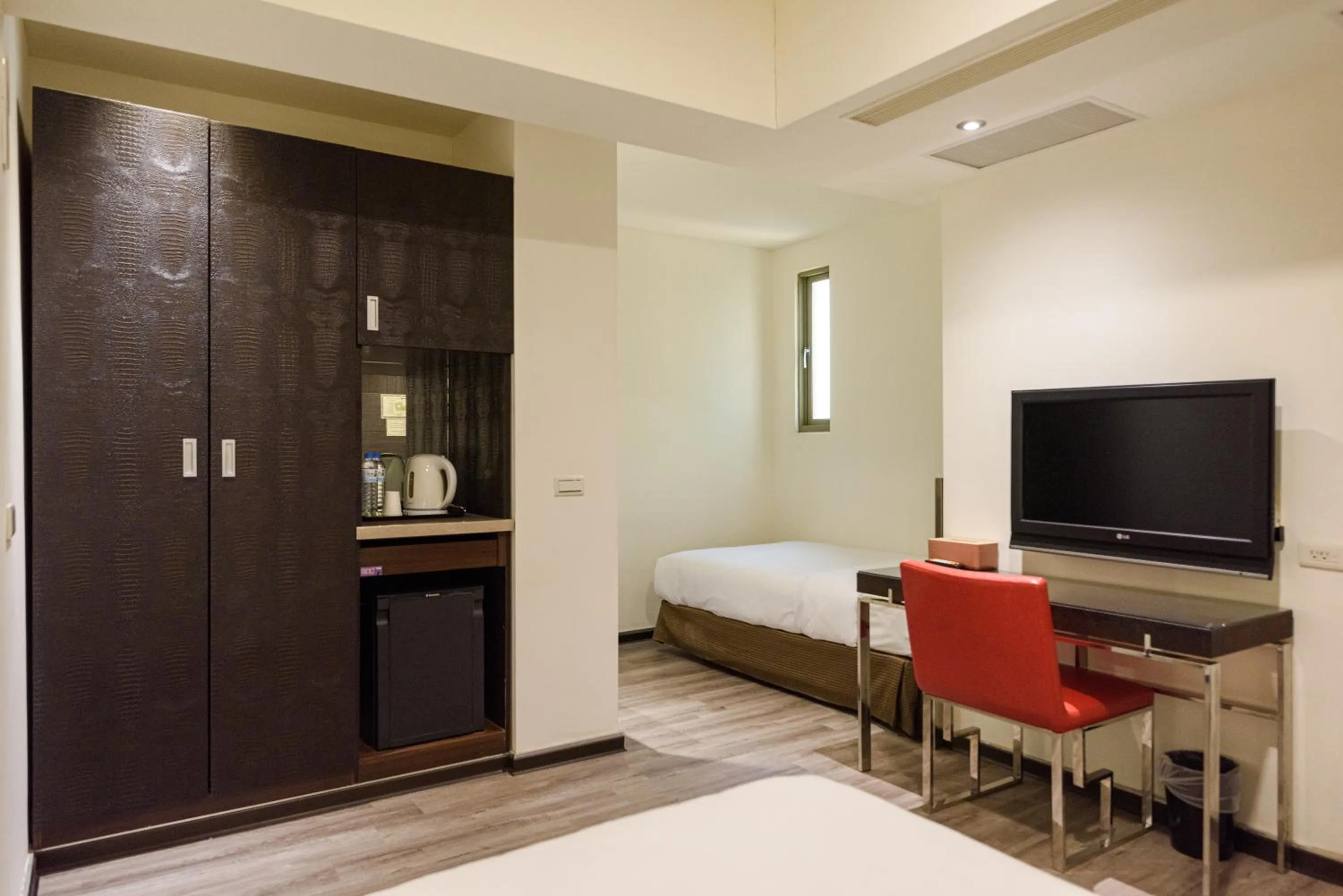 Bed in Jih Lih Hotel