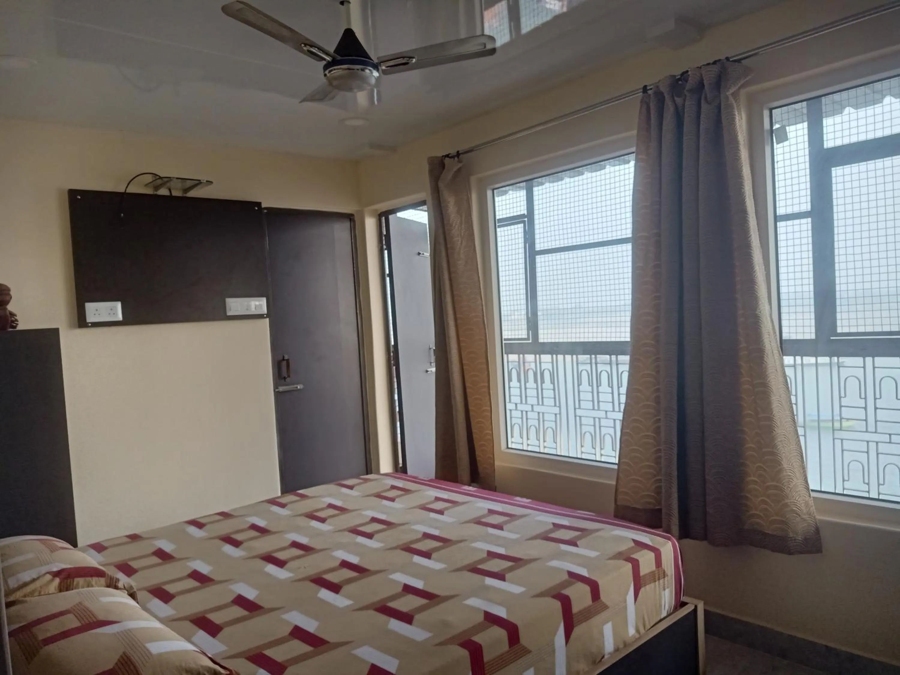 View (from property/room), Bed in Scindhia Guest House