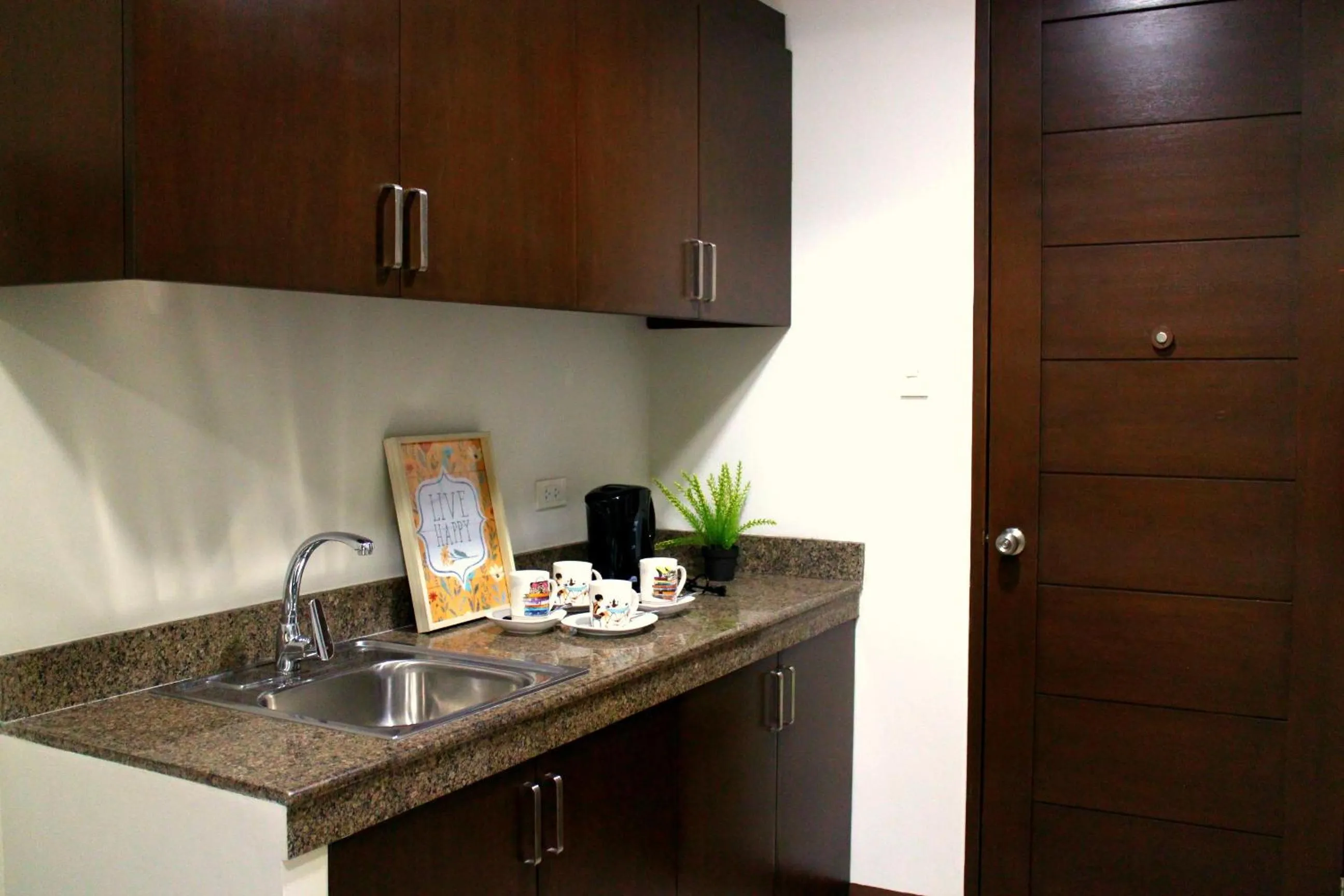 Kitchen or kitchenette in Ortigas Budget Hotel - Kapitolyo