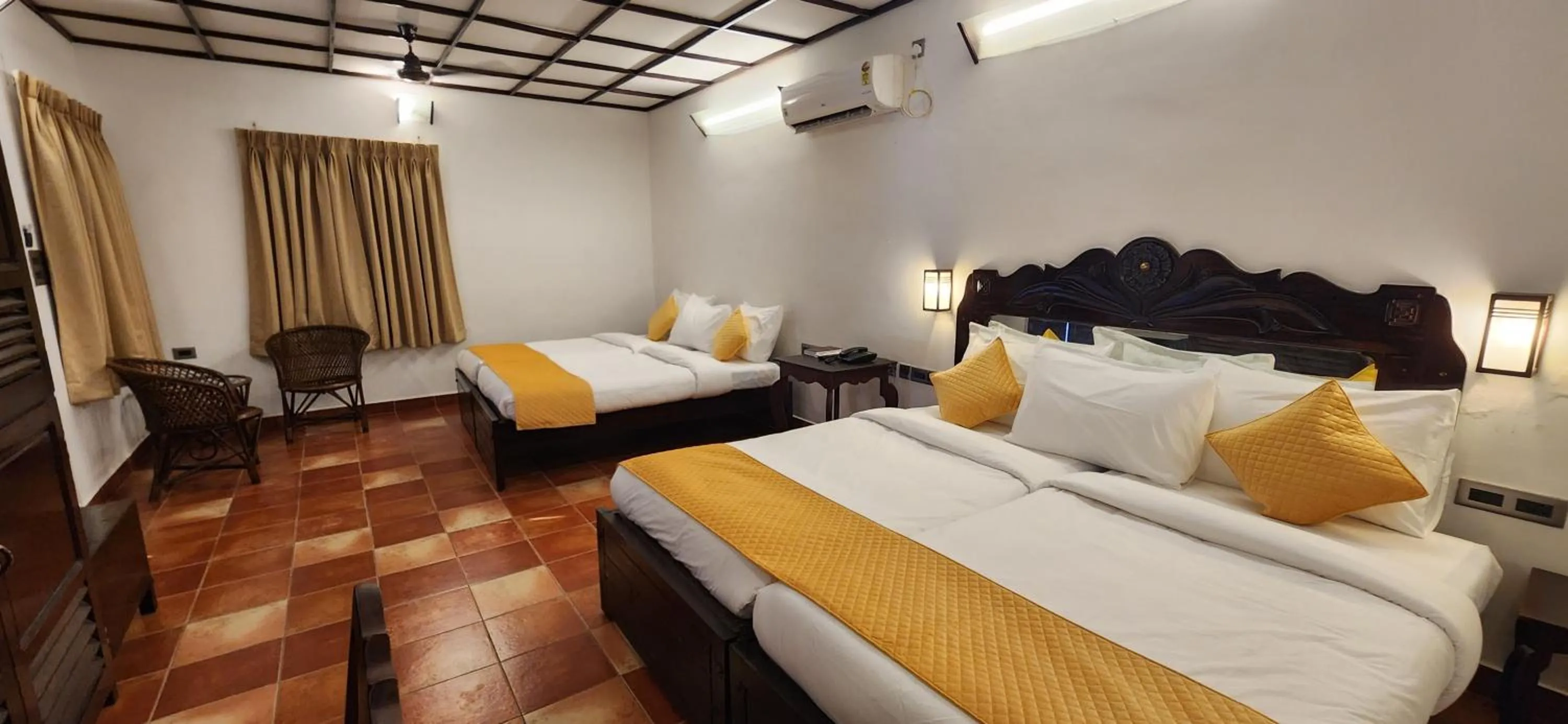 Bed in Kumarakom Tharavadu - A Heritage Hotel, Kumarakom By Perfect Stays