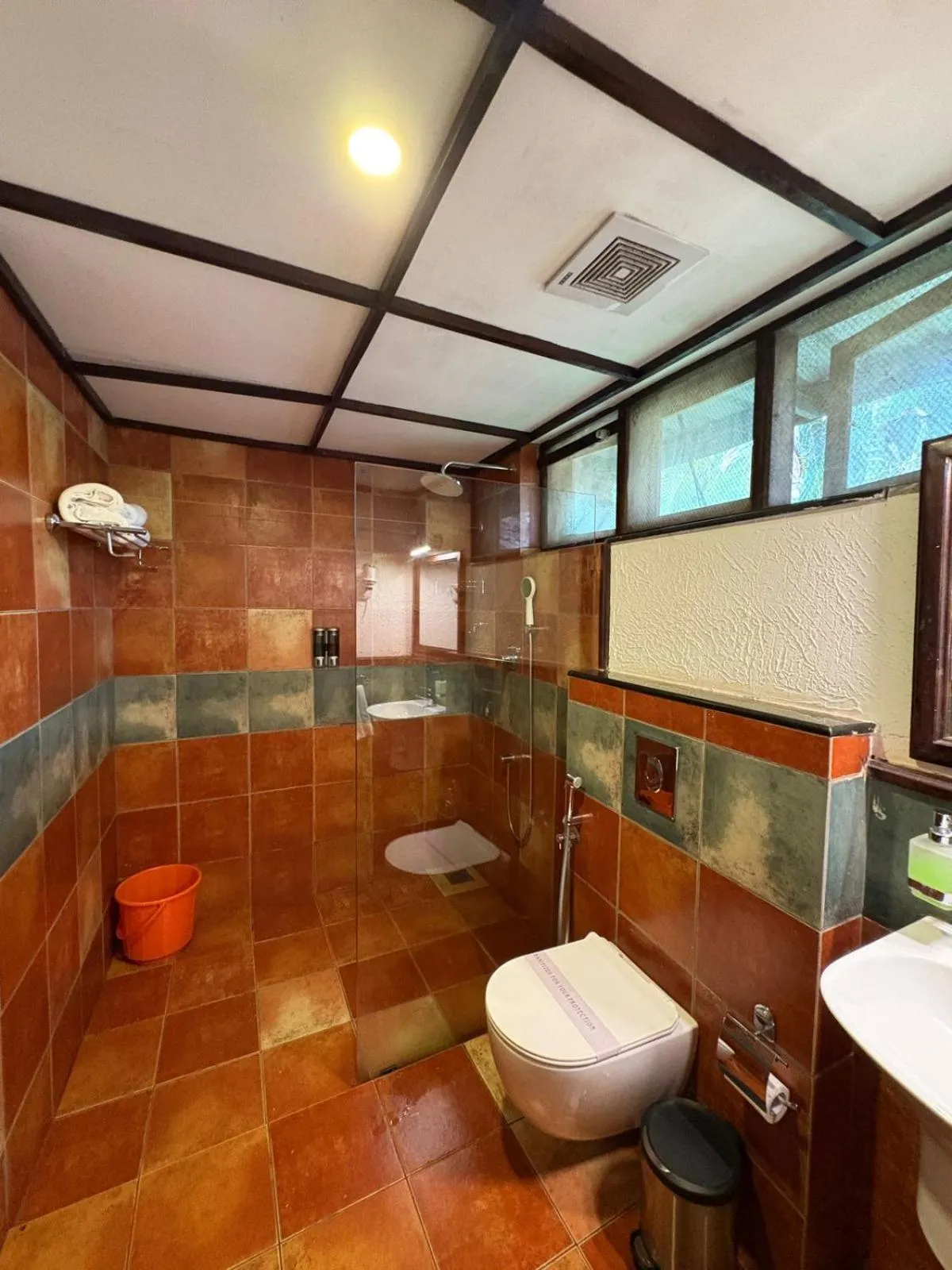 Bathroom in Kumarakom Tharavadu - A Heritage Hotel, Kumarakom By Perfect Stays