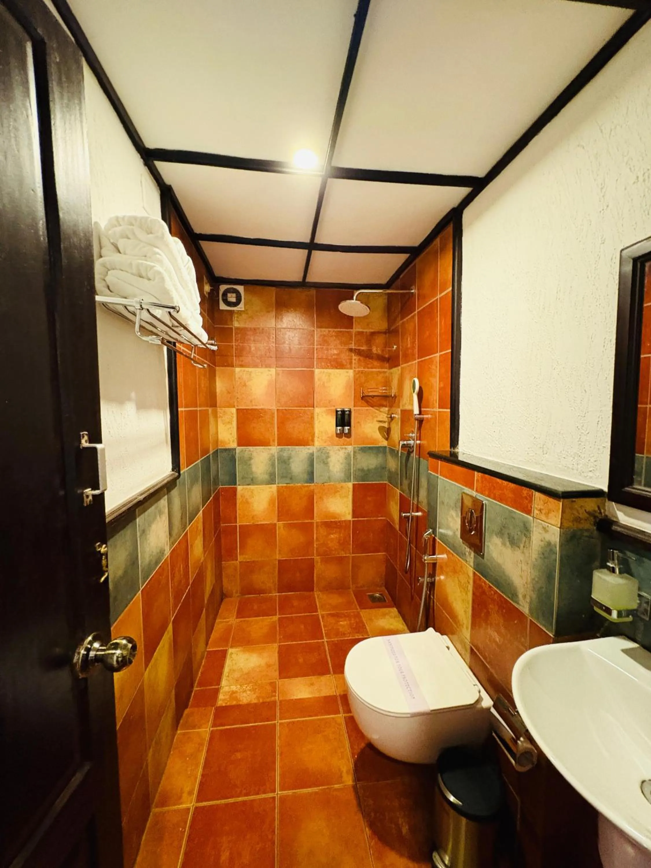 Bathroom in Kumarakom Tharavadu - A Heritage Hotel, Kumarakom By Perfect Stays