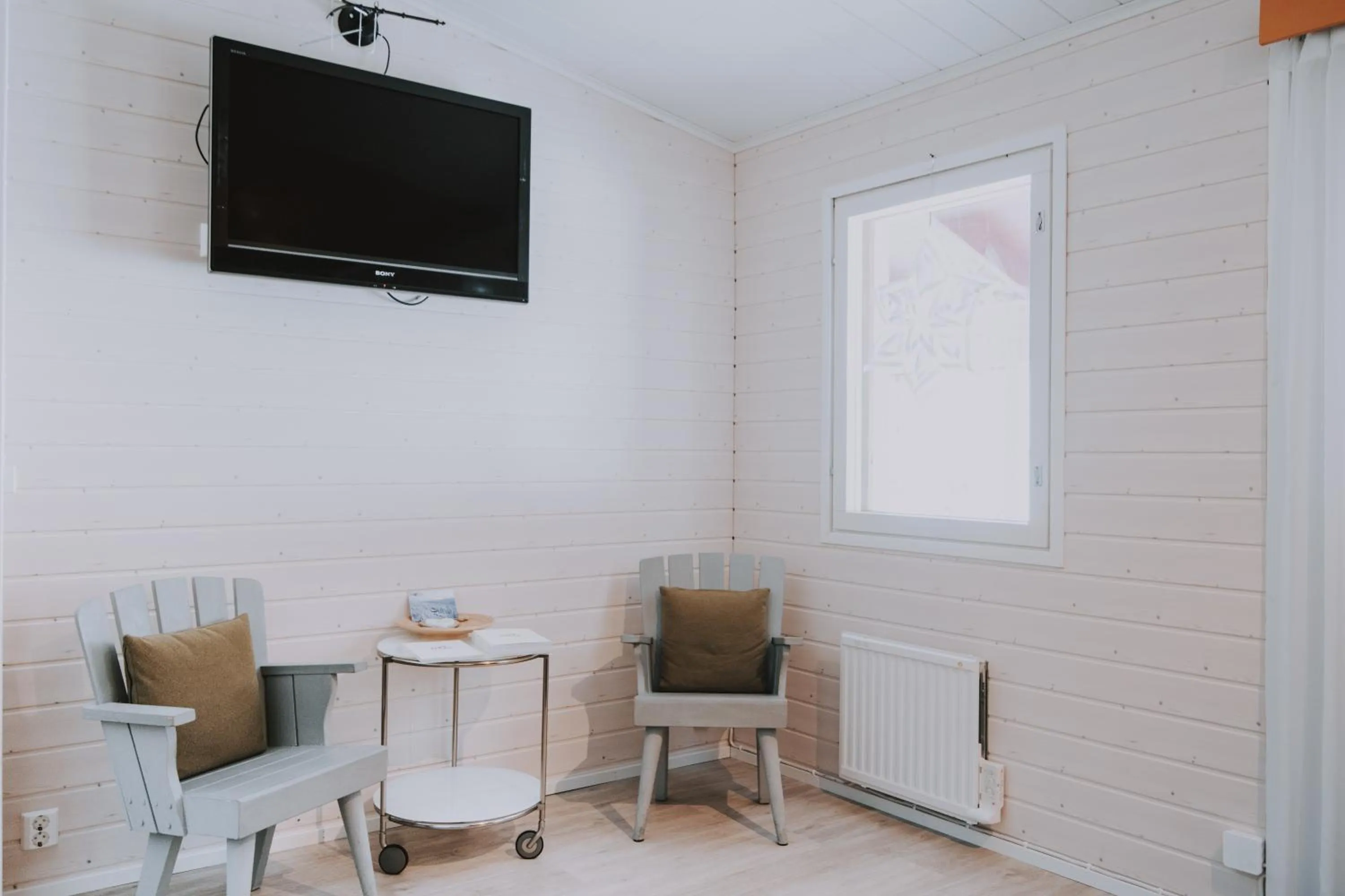 Communal lounge/ TV room in Kuerkievari KuerHotel