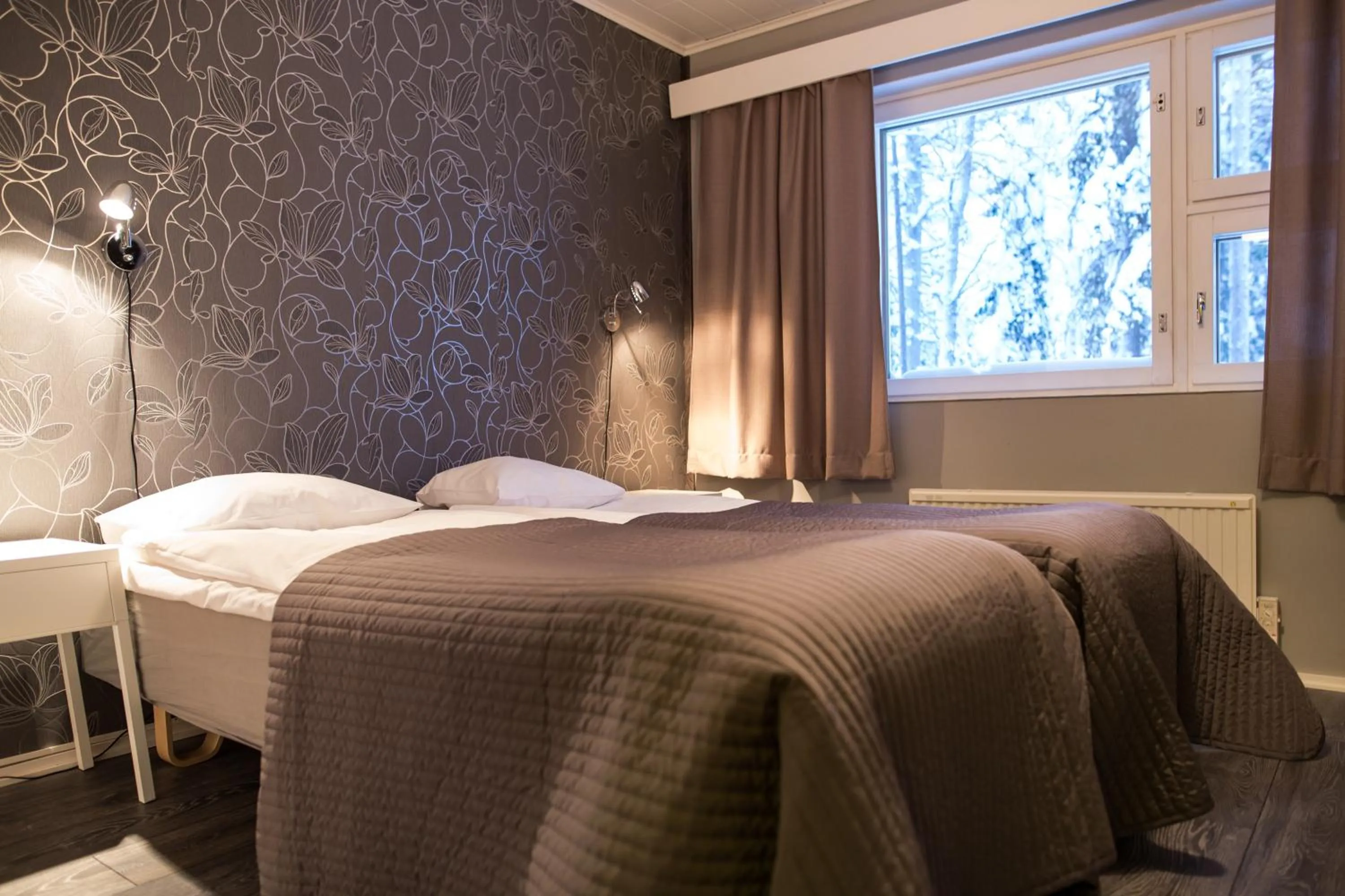 Bed in Kuerkievari KuerHotel