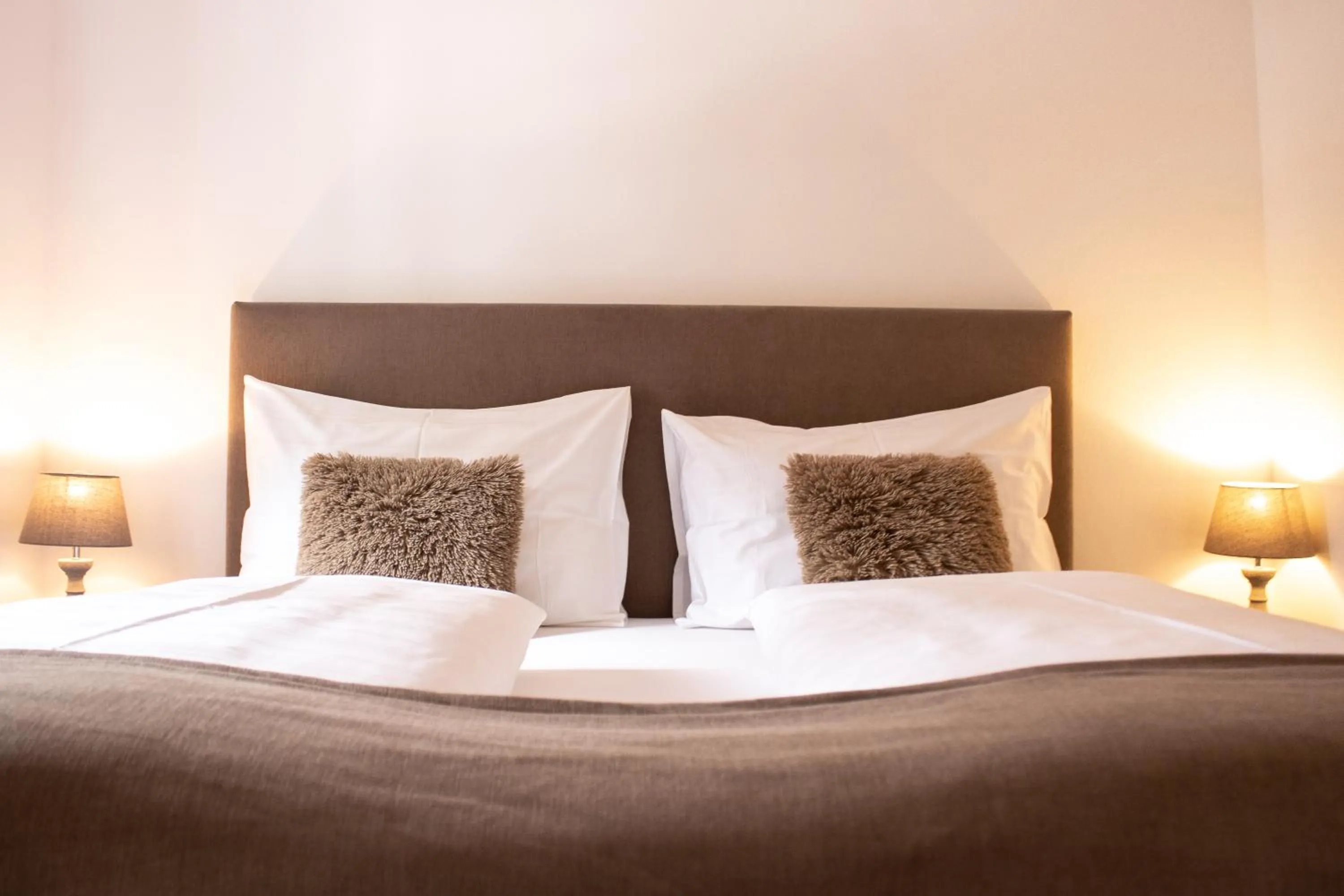 Bed in Fenix Hall Boutique Hotel Hallstatt