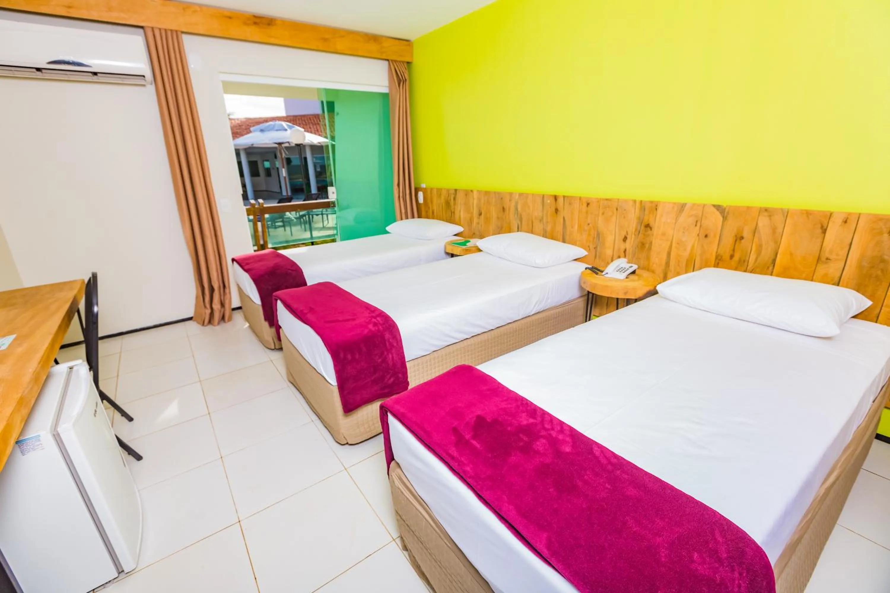 Bed in Arrey Beach Hotel