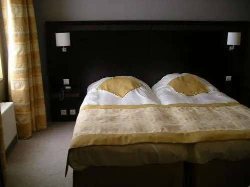 Bed in Hotel Les Mignees