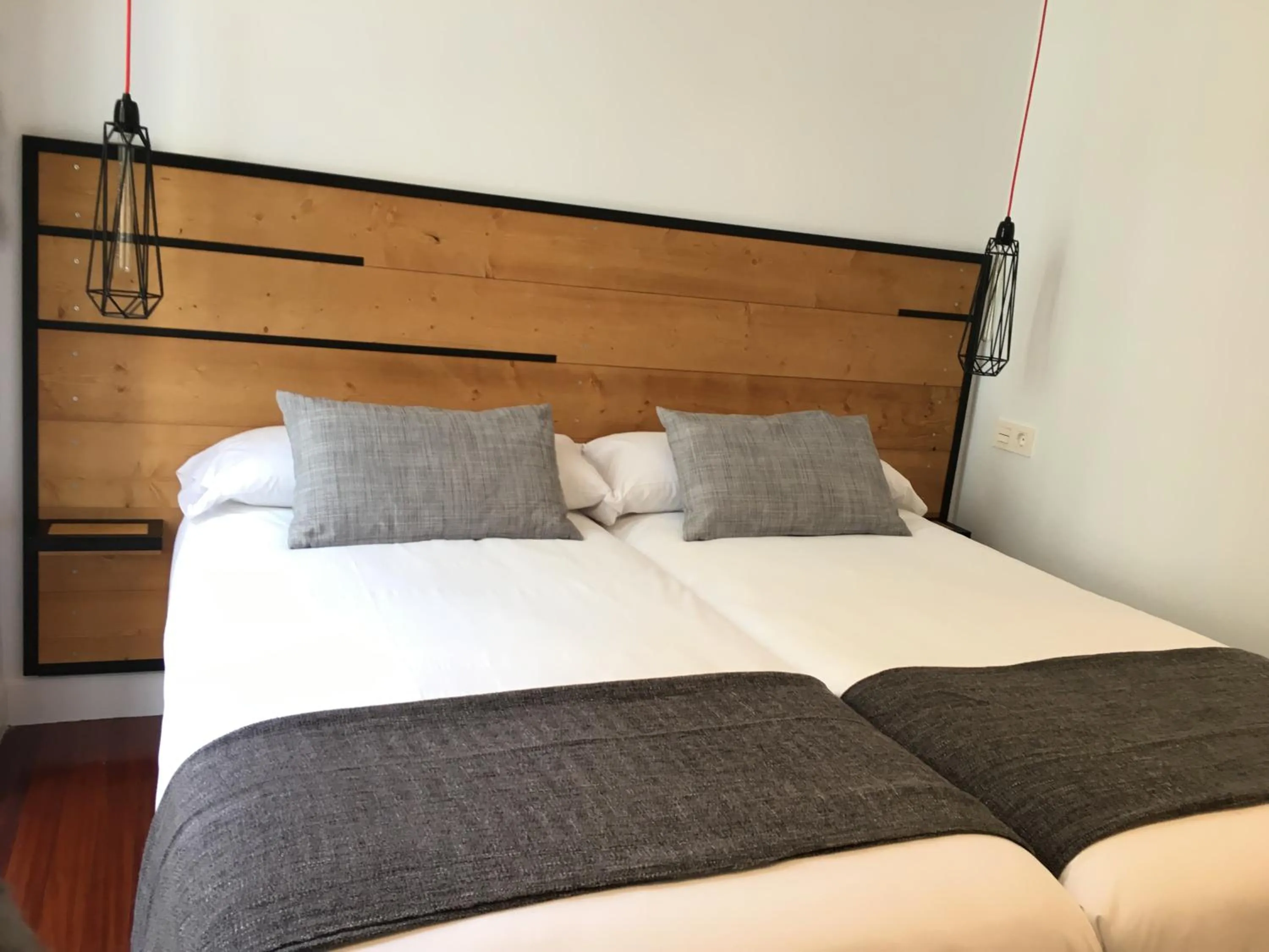 Photo of the whole room, Bed in Pensión La Perla