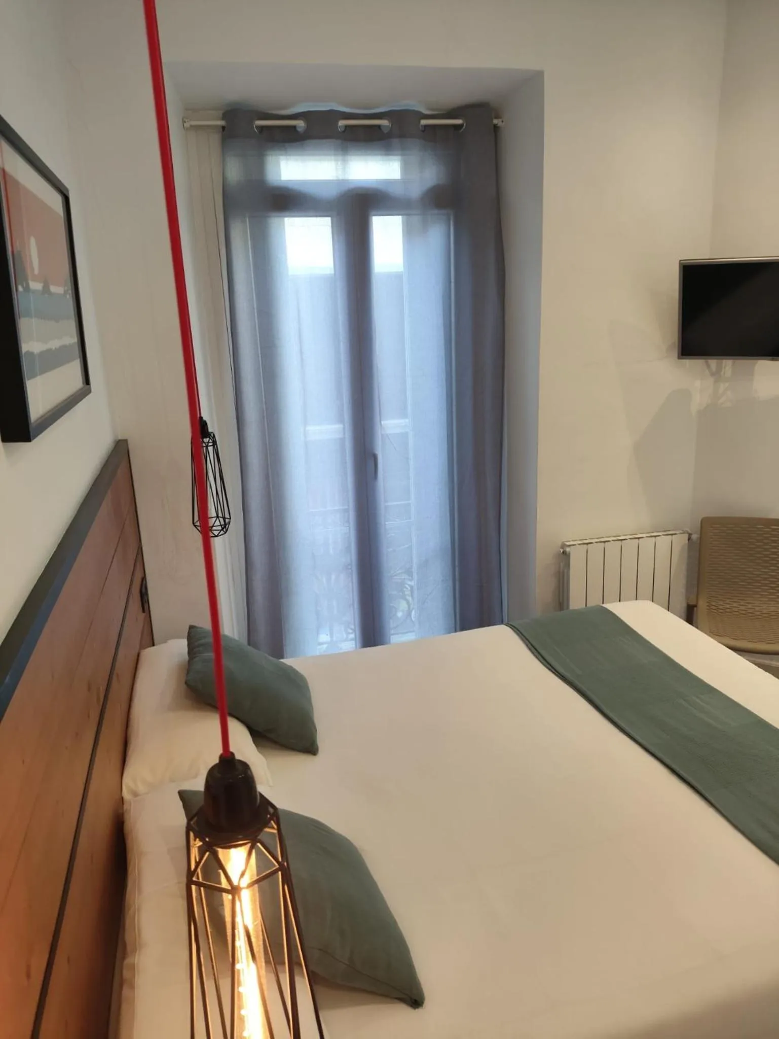 Photo of the whole room, Bed in Pensión La Perla