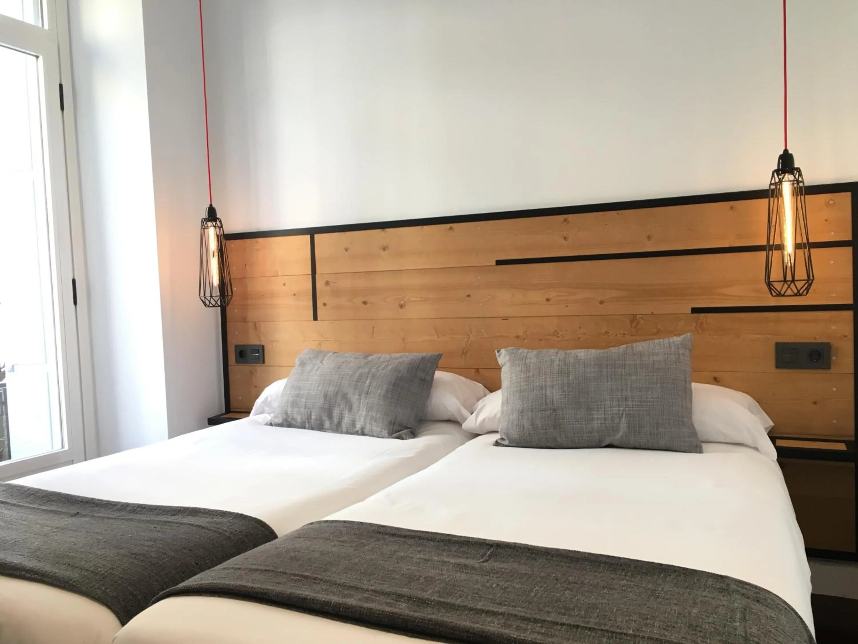 Photo of the whole room, Bed in Pensión La Perla