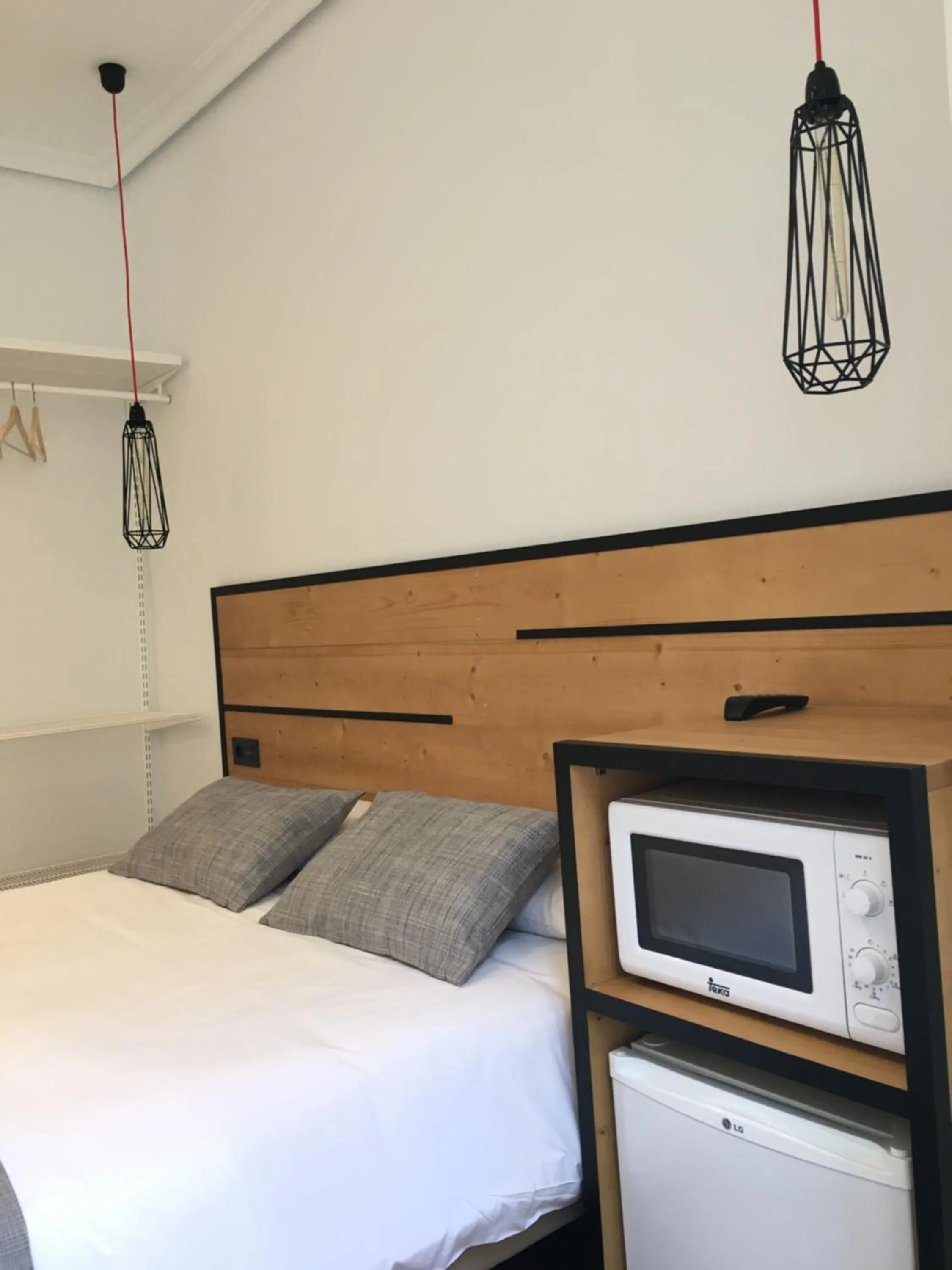 Photo of the whole room, Bed in Pensión La Perla