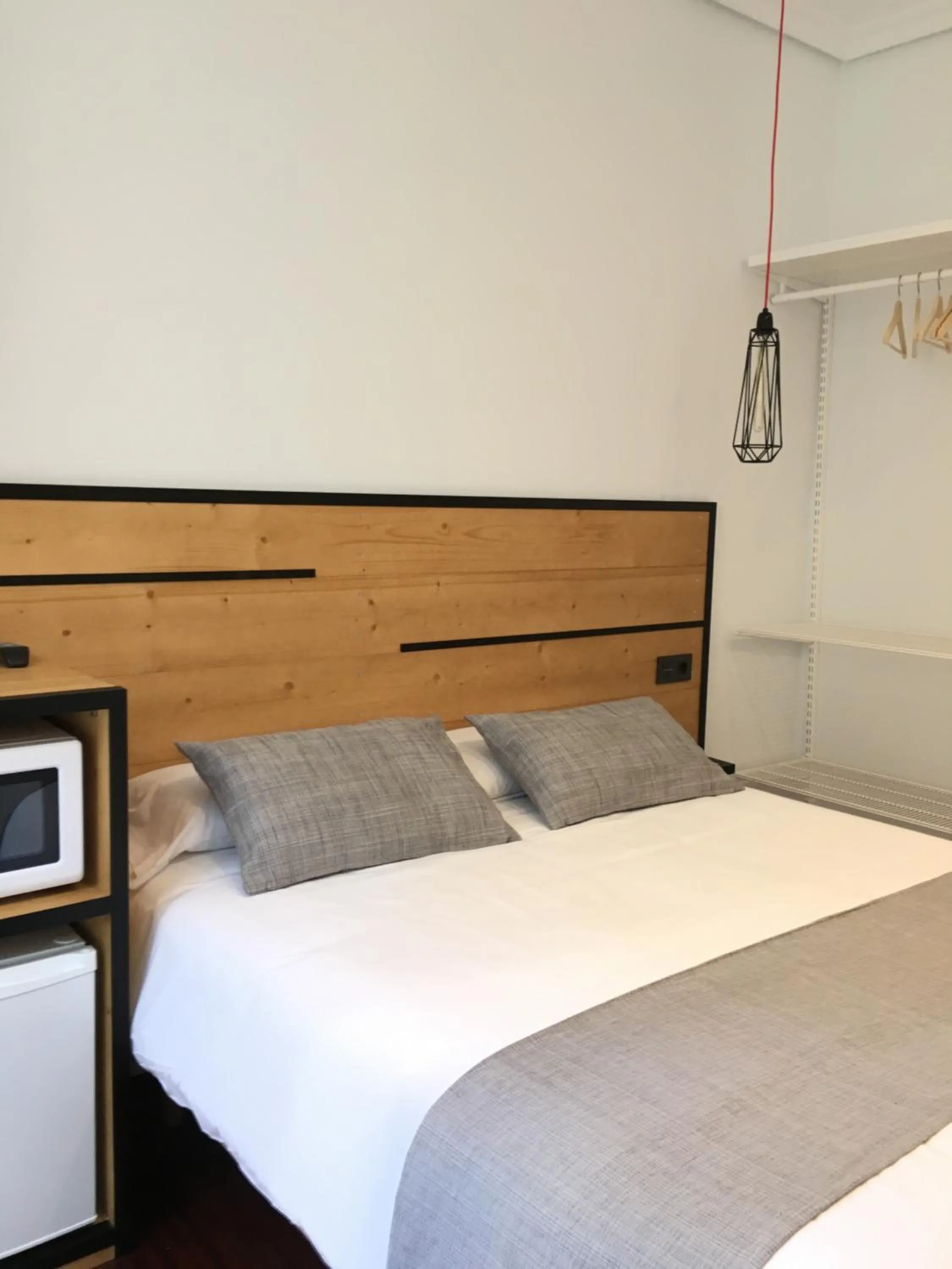 Photo of the whole room, Bed in Pensión La Perla