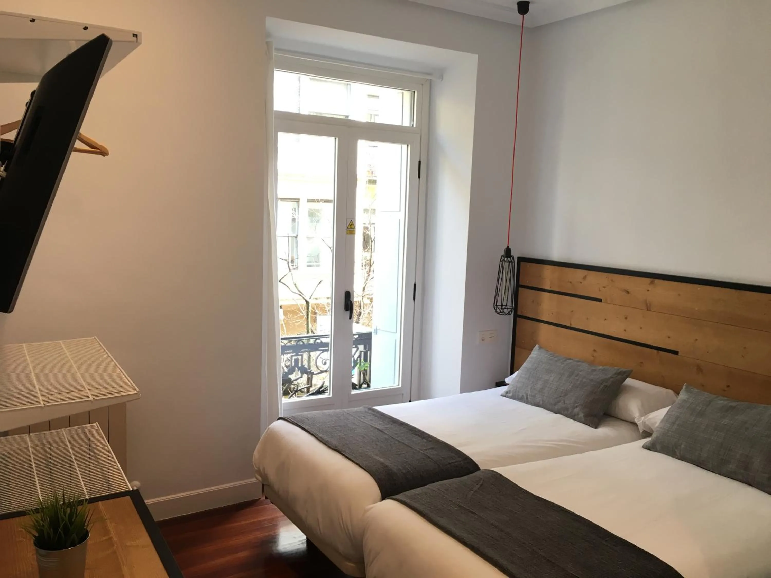 Photo of the whole room, Bed in Pensión La Perla