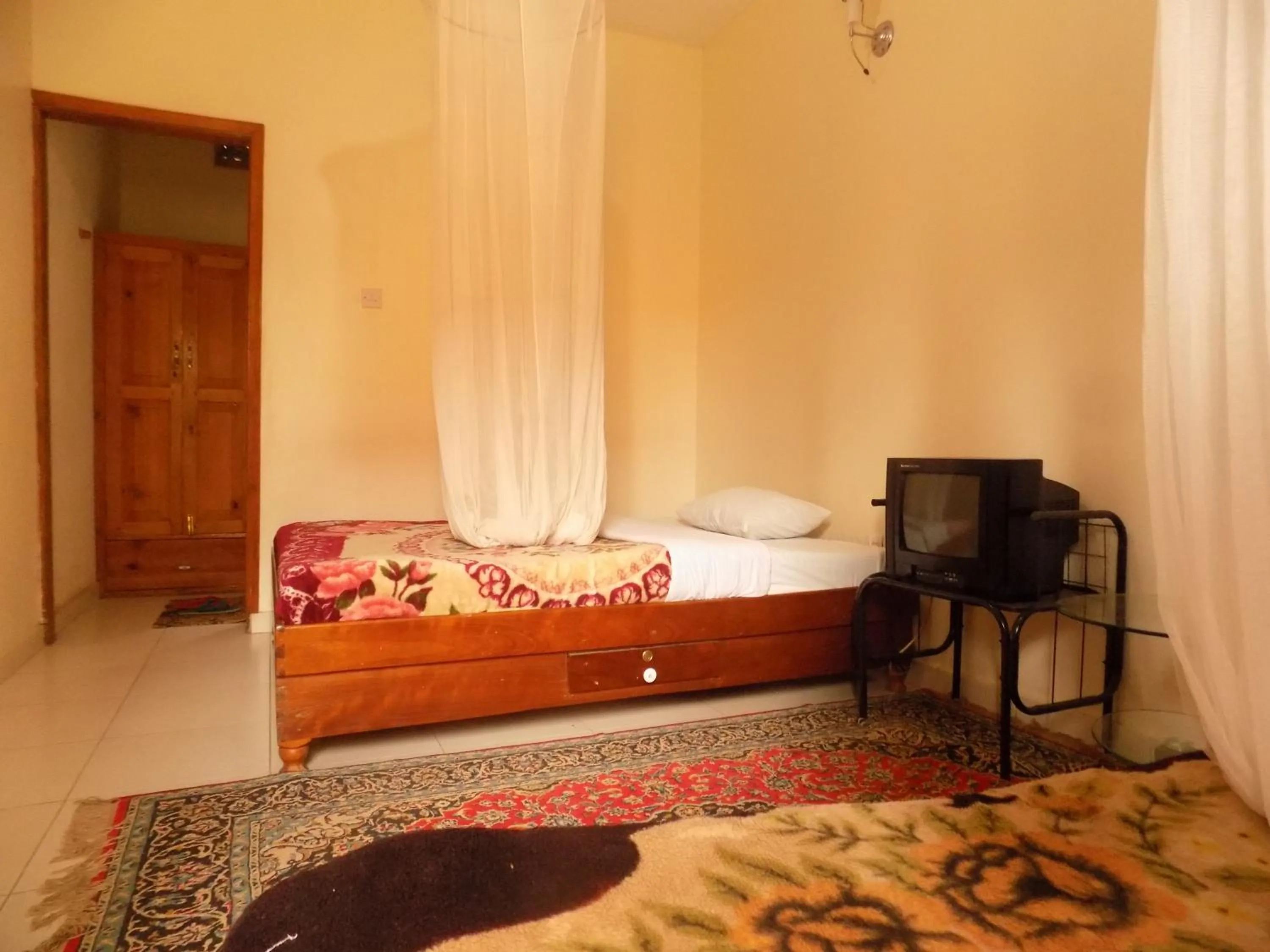 Bed in Meliva Guest House Mbarara