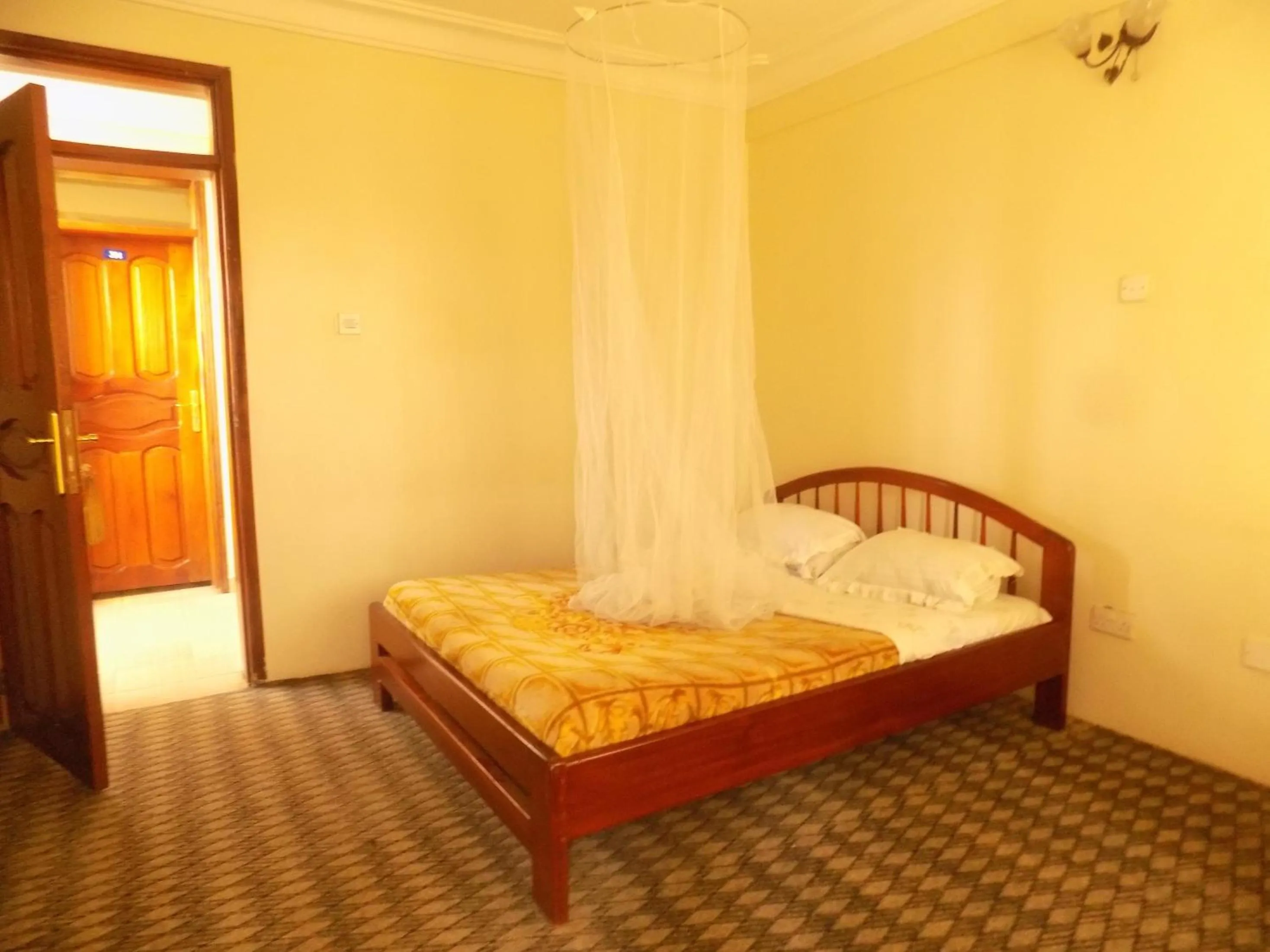 Bed in Meliva Guest House Mbarara