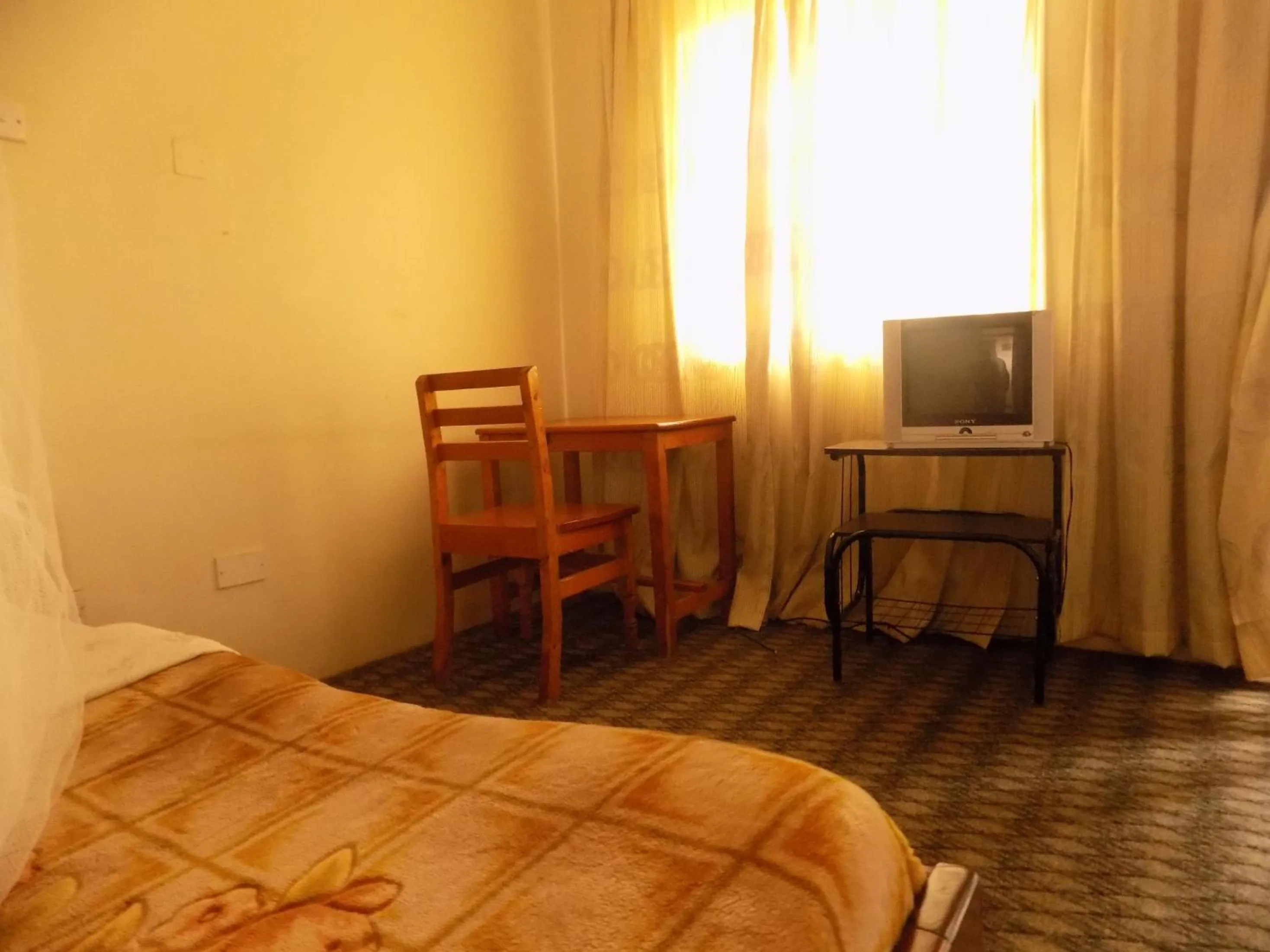 Bed in Meliva Guest House Mbarara