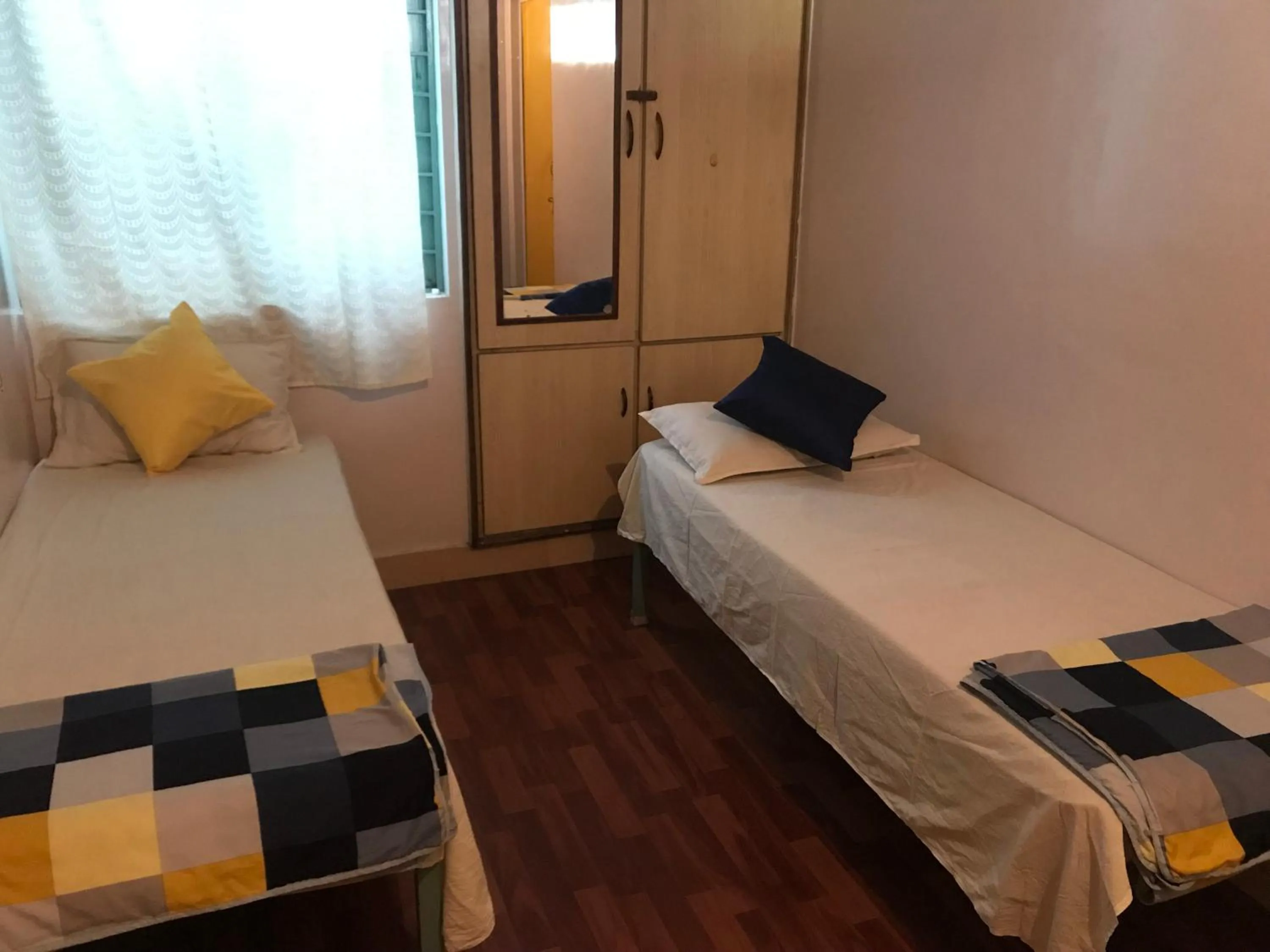 Decorative detail, Bed in The Little Blue Window Hostel