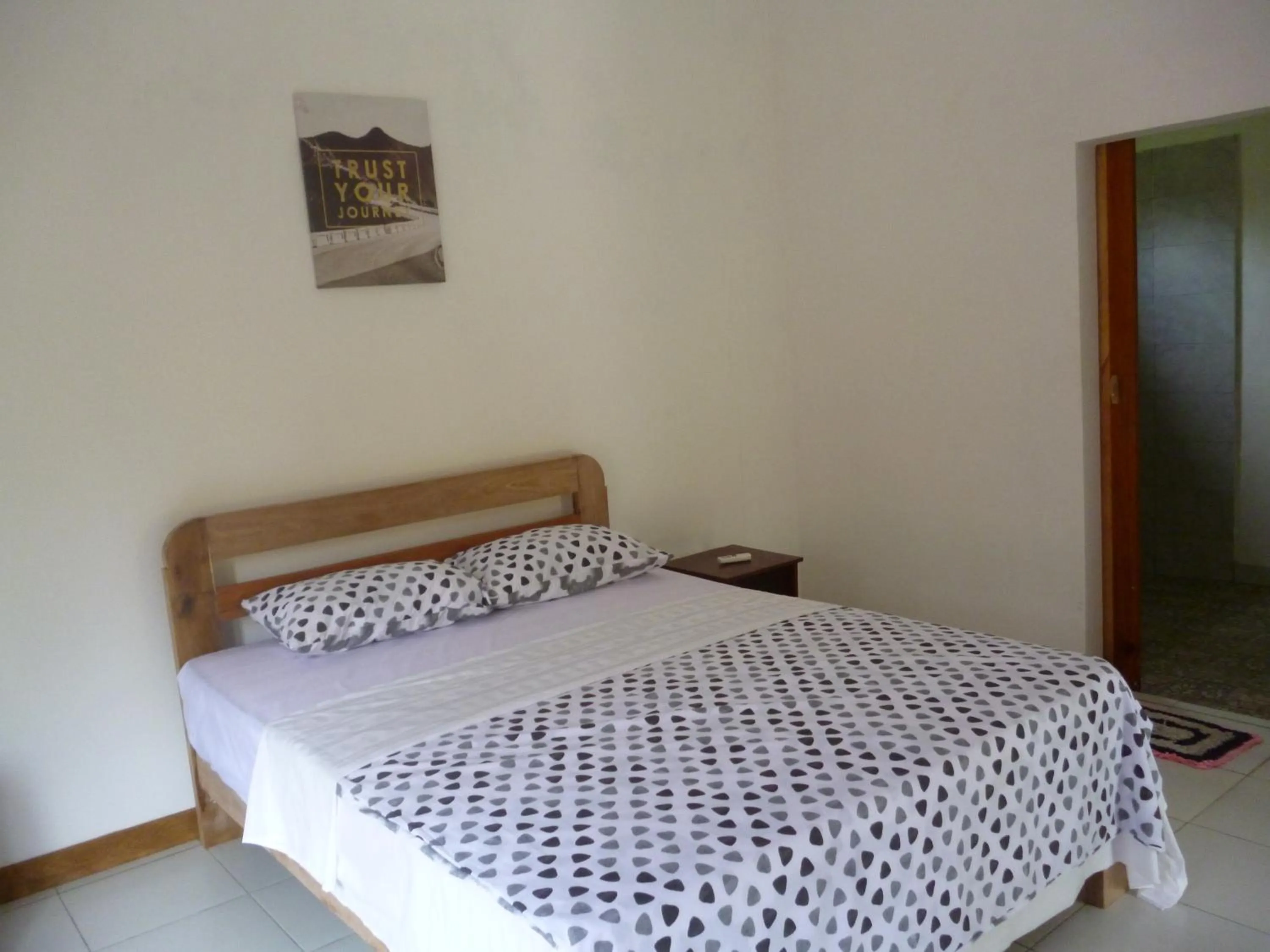 Bedroom in Dewi Garden Guesthouse