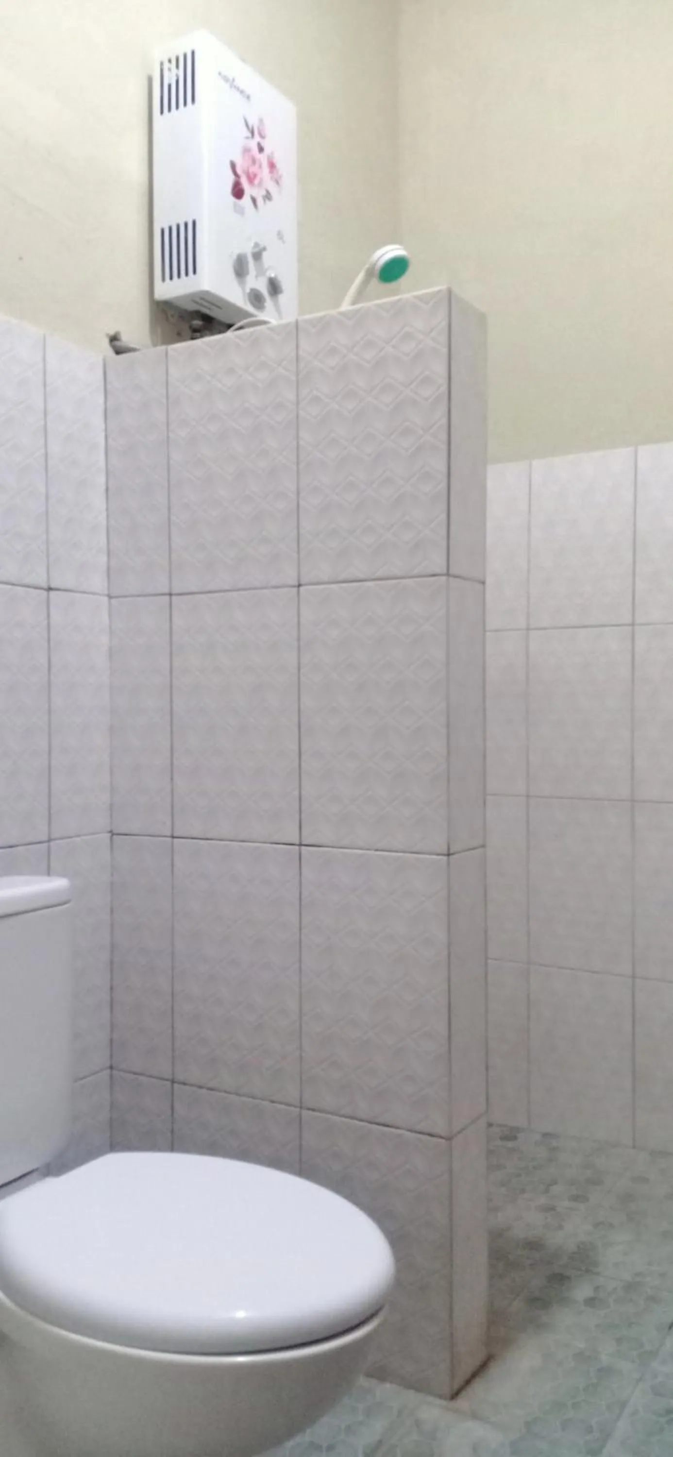 Toilet in Dewi Garden Guesthouse