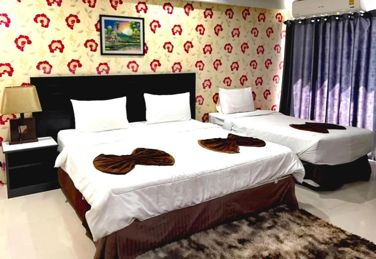 Bed in Grand Pruksa Siri Apartment