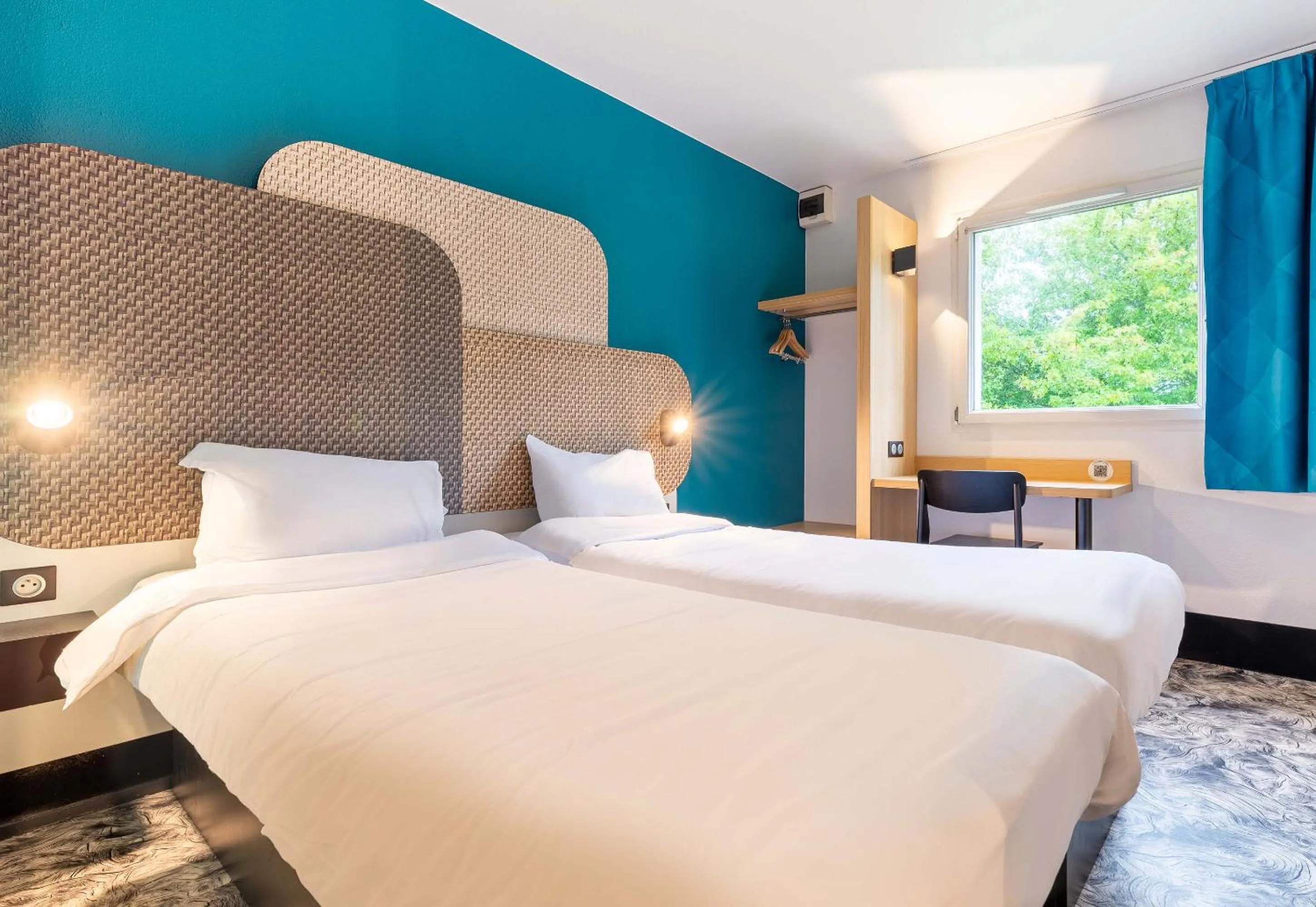 Bedroom, Bed in B&B HOTEL Nantes Atlantis Le Zenith