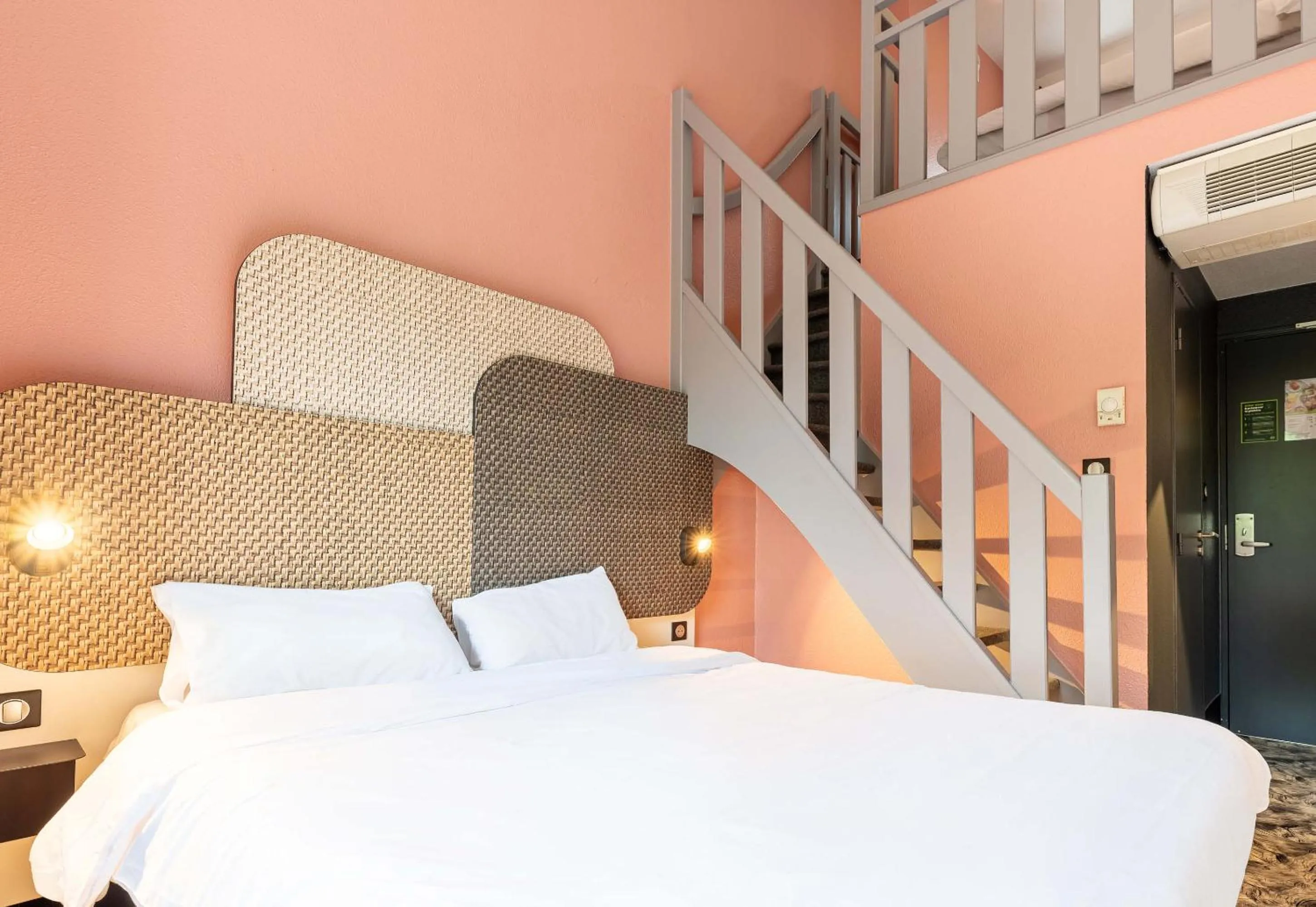 Bed in B&B HOTEL Nantes Atlantis Le Zenith