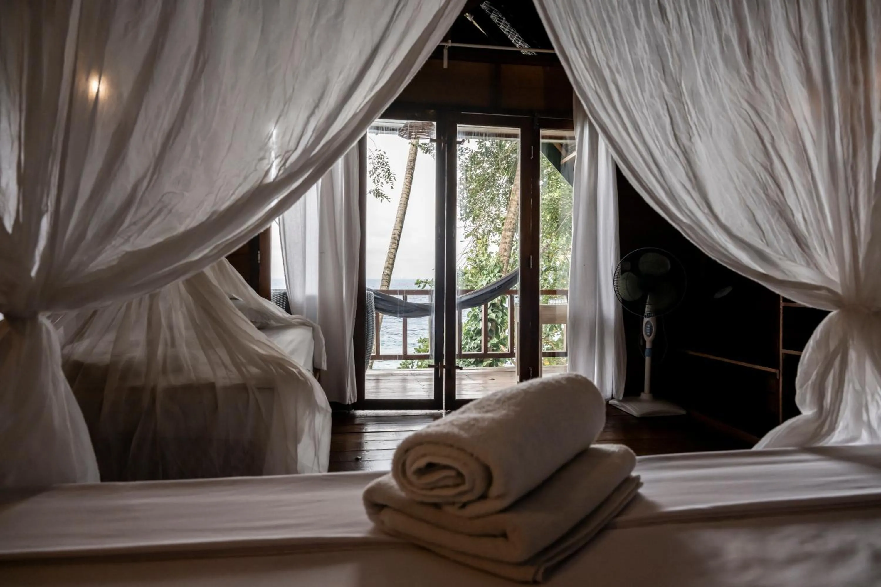 Bed in Casa Nemo Beach Resort & Spa