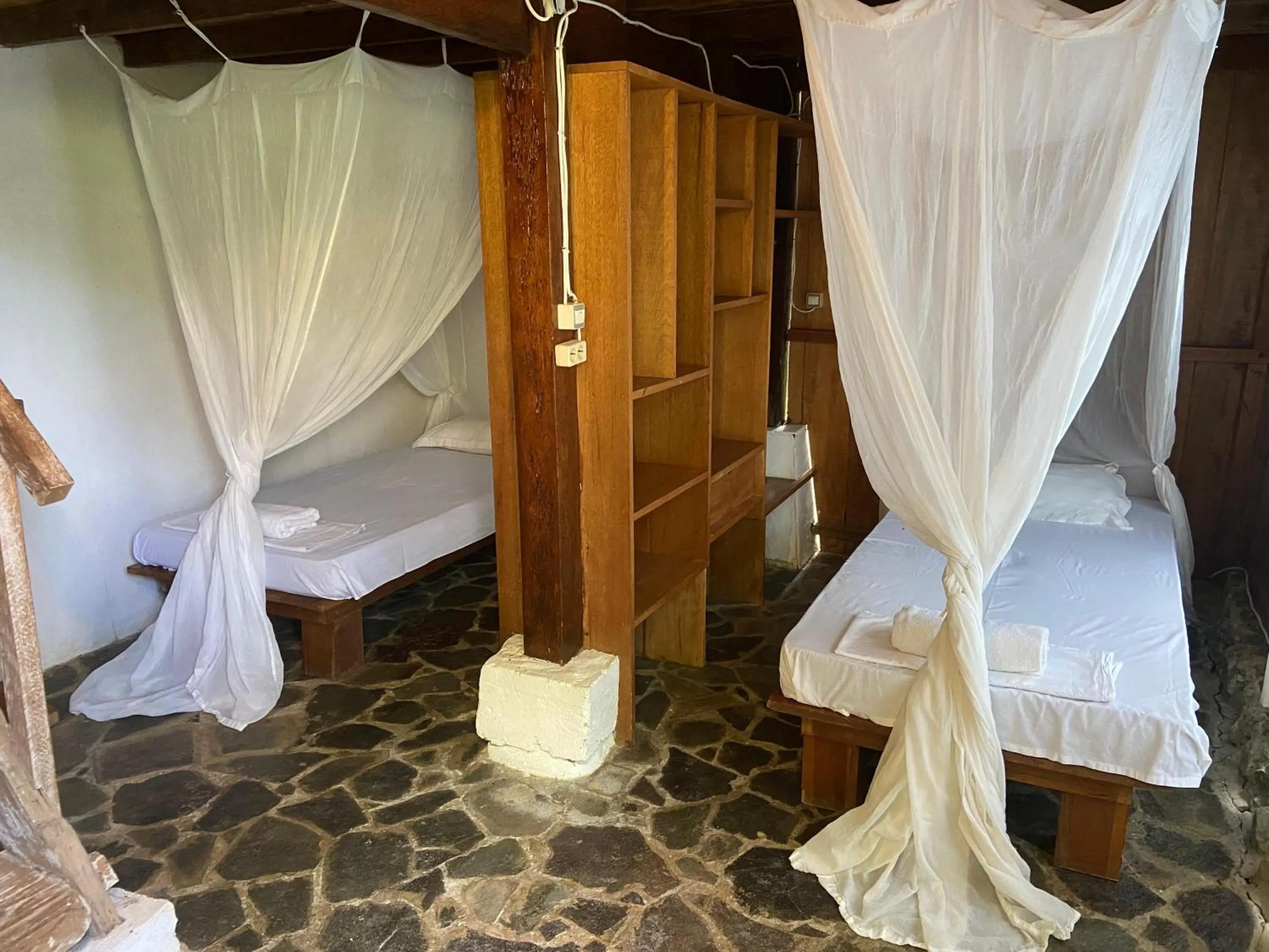 Bed in Casa Nemo Beach Resort & Spa