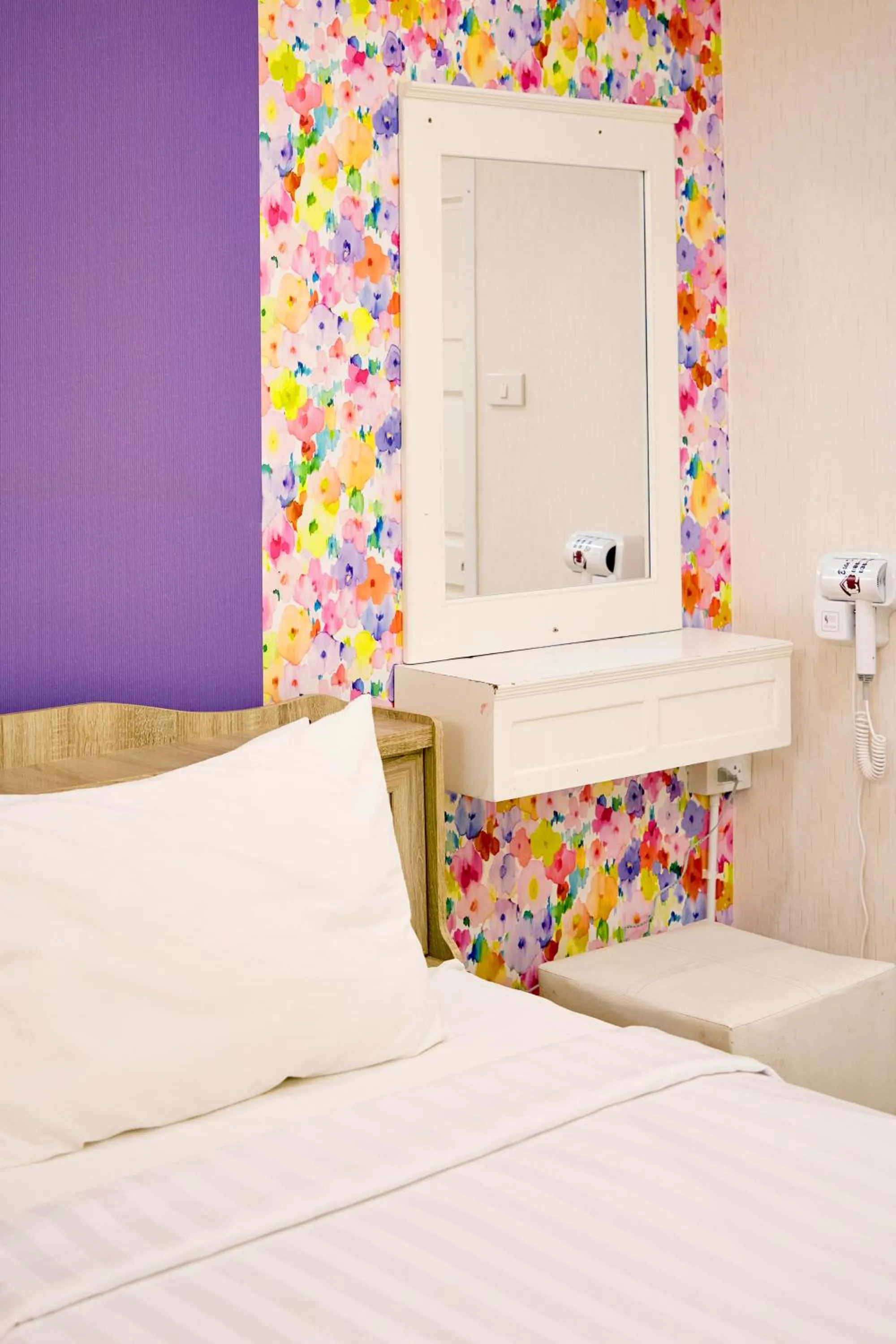 Bed in Baan Dara Resort