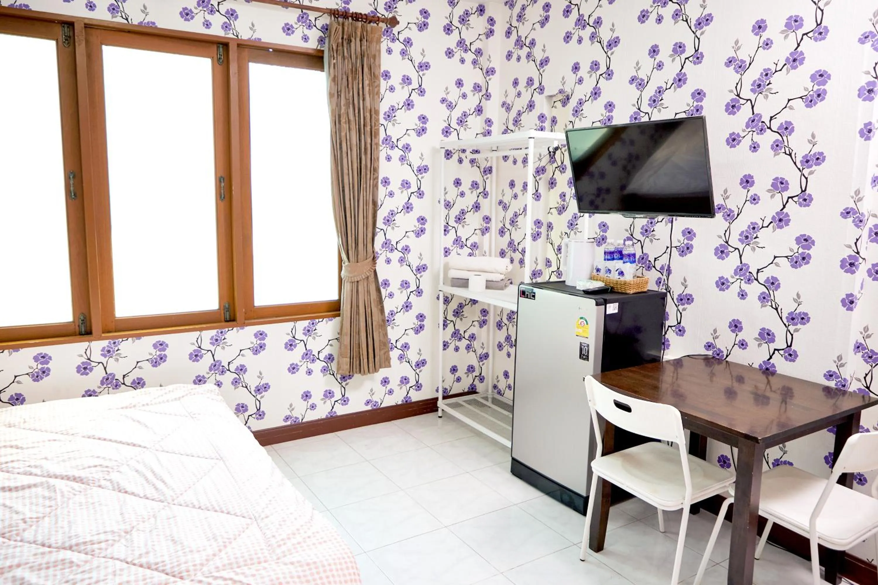 Bed in Baan Dara Resort