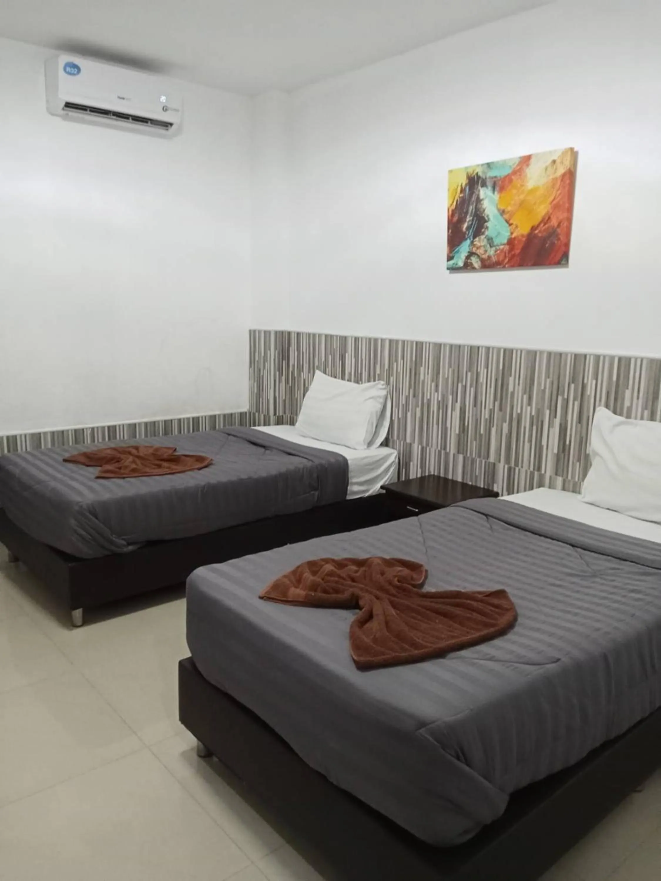 Bed in PS Hotel Saraburi