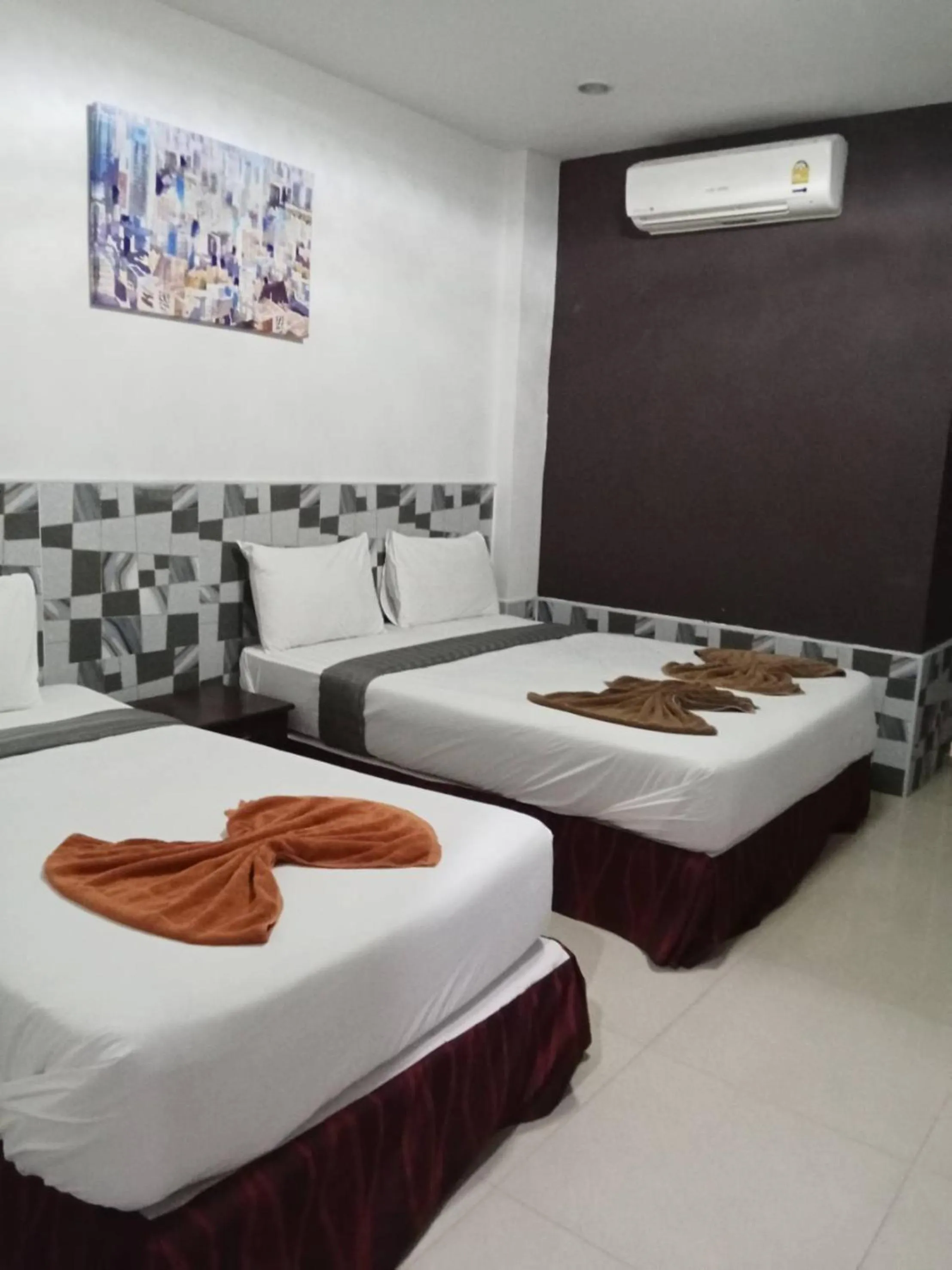 Bed in PS Hotel Saraburi