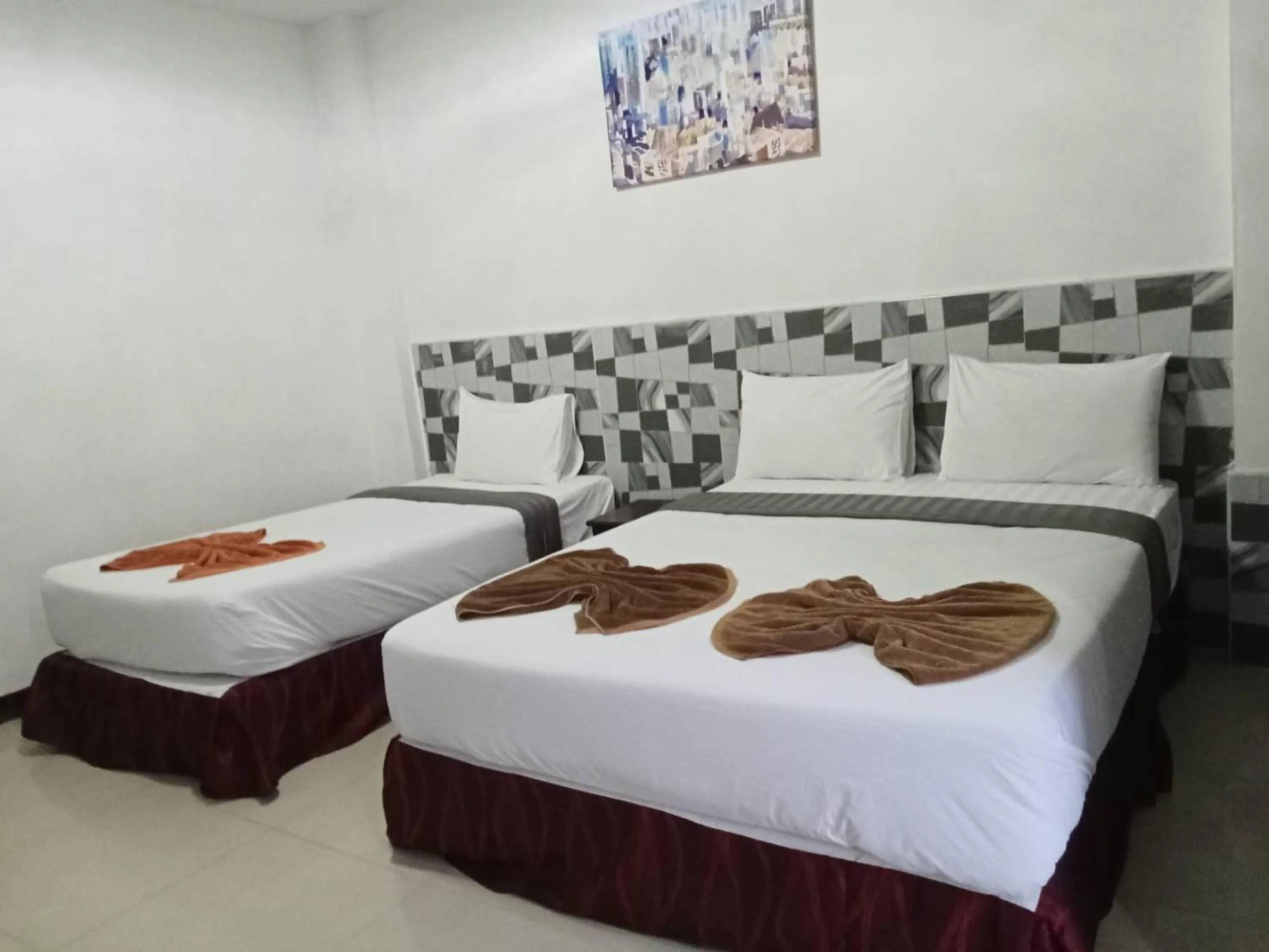 Bed in PS Hotel Saraburi